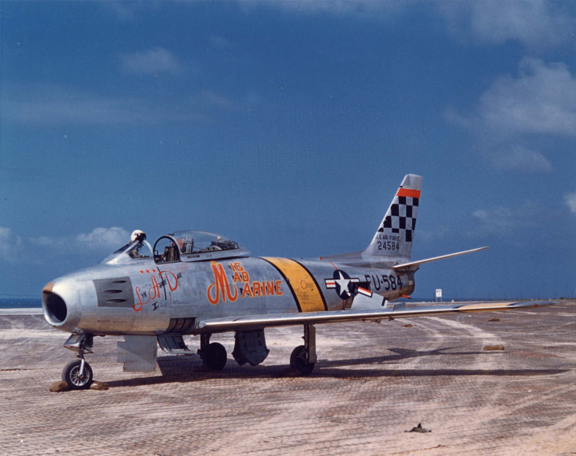 John Glenn's aircraft of the USAF's 51st Fighter Wing in Korea. There were three stars by the windscreen indicating the three MiG-15s he had shot down and "Lyn, Annie and Dave" was painted on the plane for his daughter, wife and son. (U.S. Air Force photo)