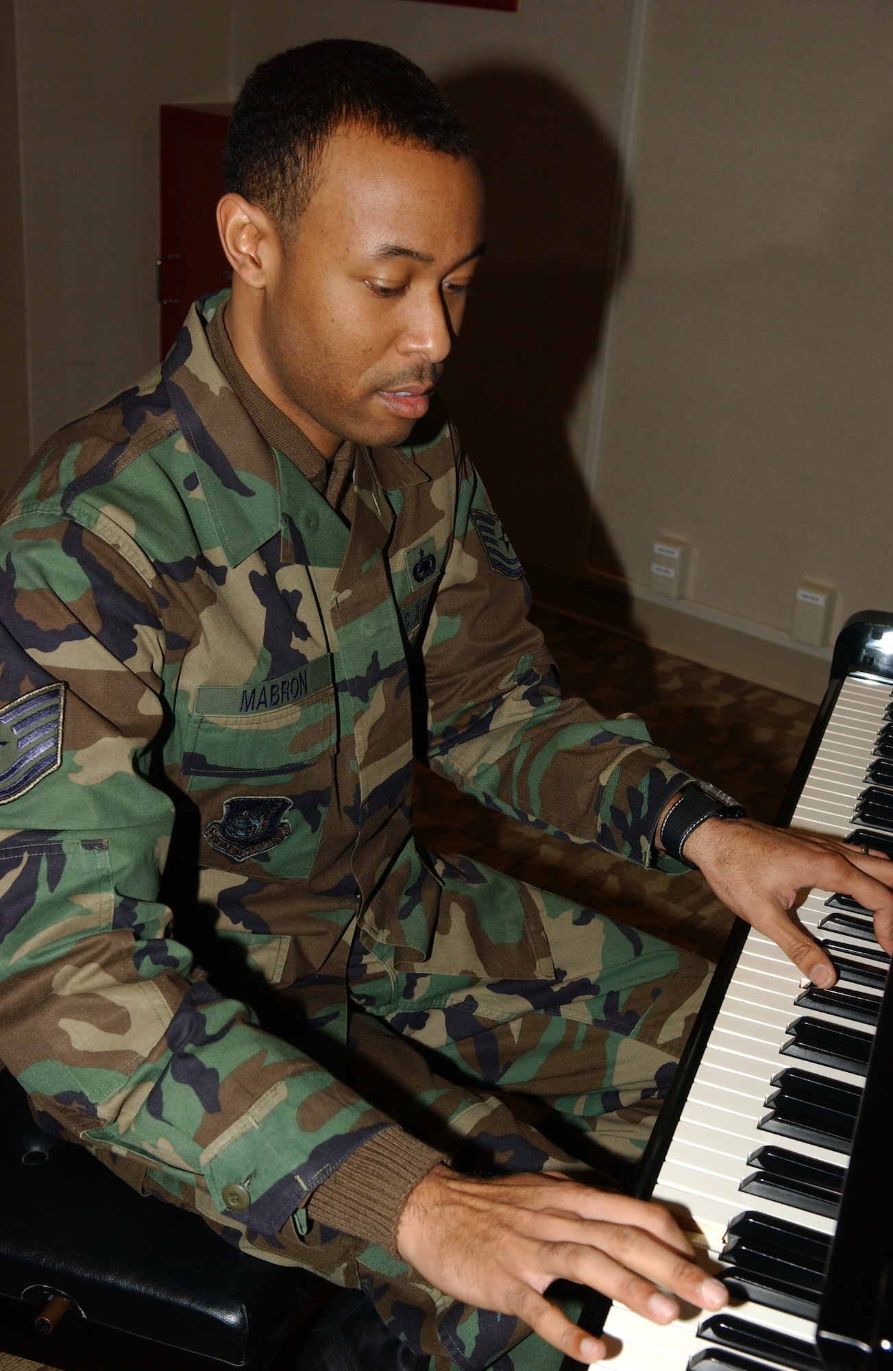 MISAWA AIR BASE, Japan -- Tech. Sgt. Lamon Mabron, 35th Logistics Readiness Squadron, plays the piano in the Mokuteki Community Center Jan. 18. Sergeant Mabron was recently selected to join Tops in Blue as a keyboardist. (U.S. Air Force photo by Senior Airman Robert Barnett)