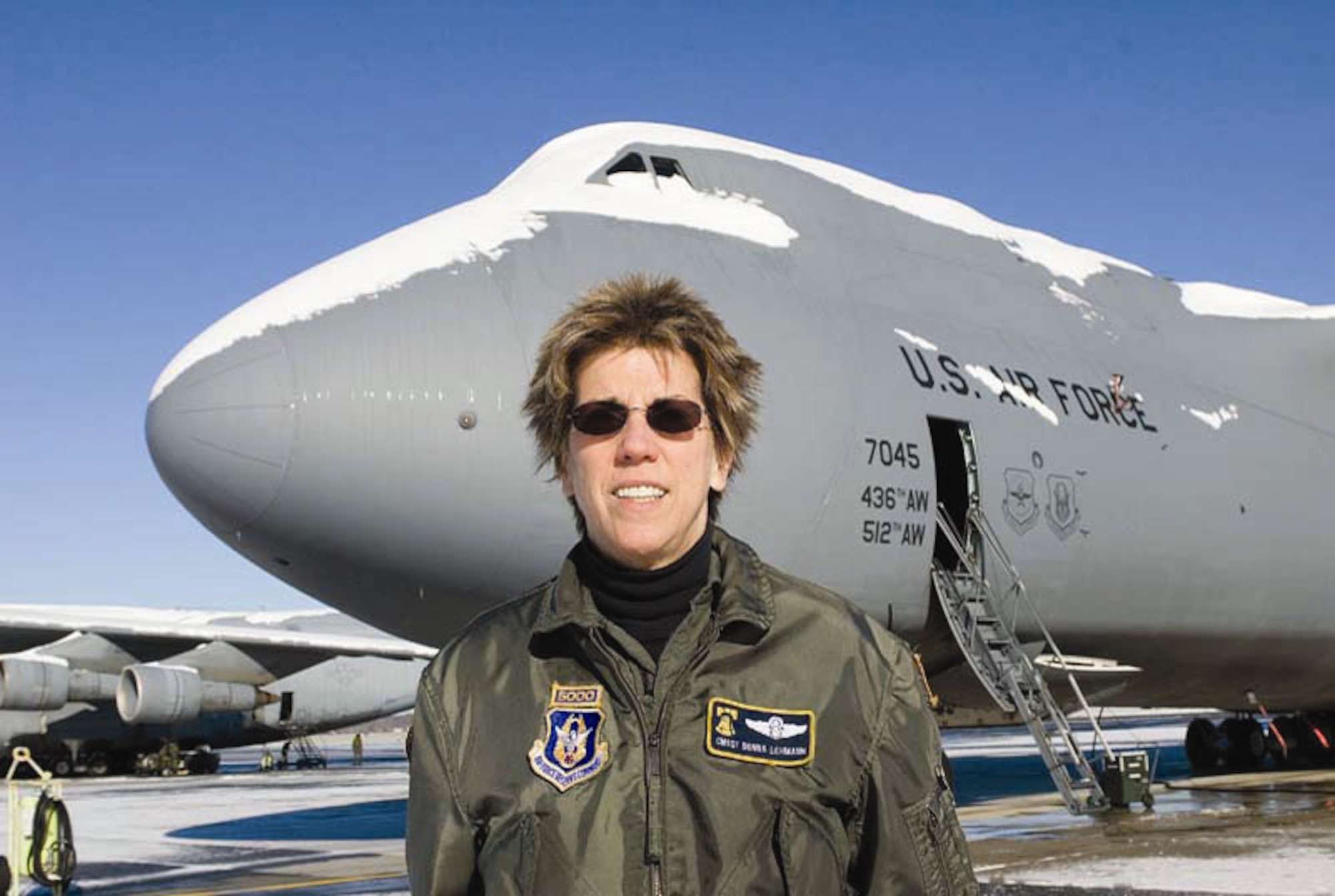 Chief Master Sgt. Donna Lehmann, the 512th Airlift Wing's first female C-5 loadmaster, retired in a ceremony Jan. 6, completing nearly 30 years of service in the Air Force Reserve.