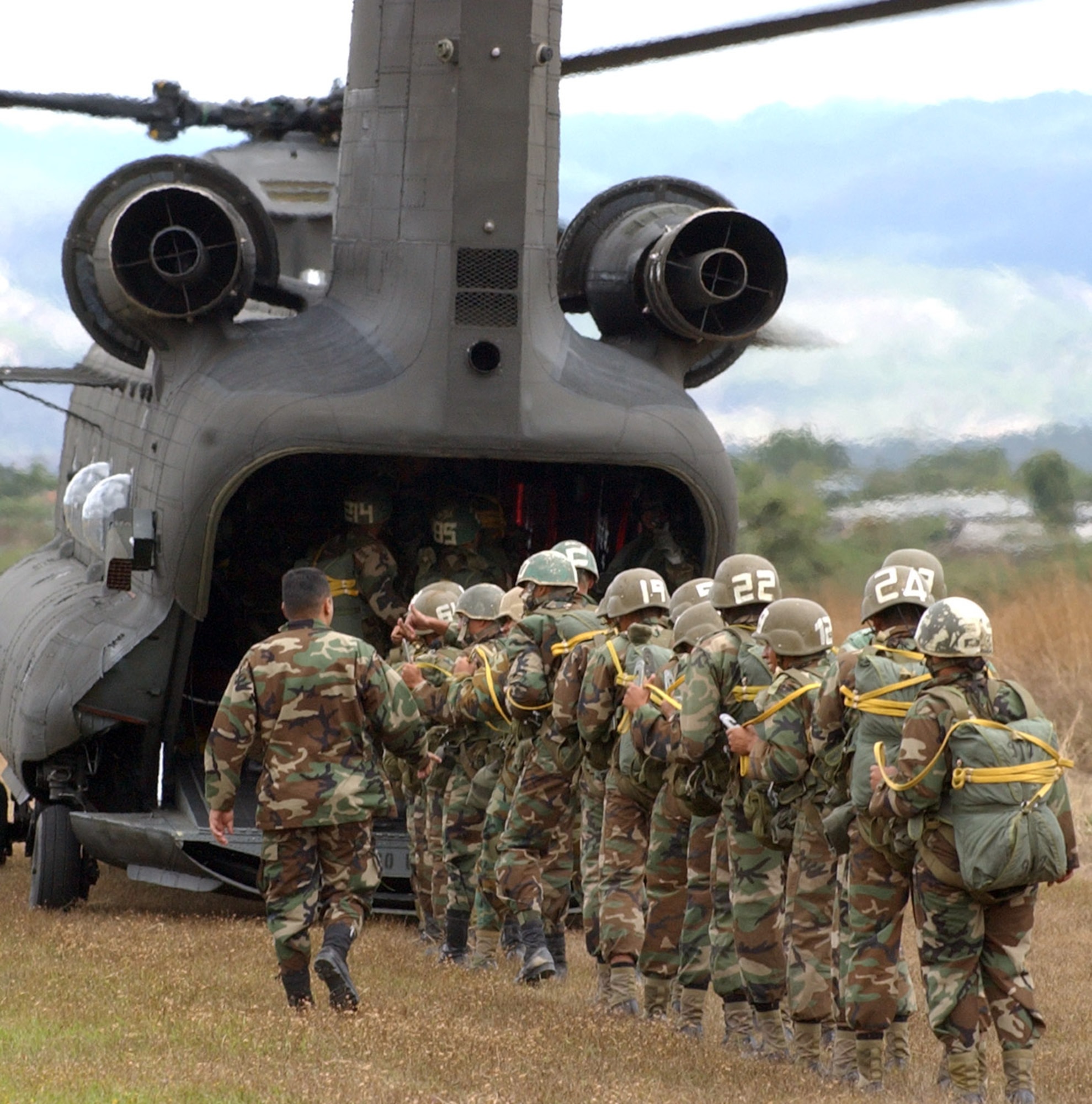 SOTO CANO AIR BASE, Honduras – Loading up eighteen per sortie, more than 250 Honduran eventually soldiers took their first step toward Airborne readiness after leaping from the back of an Army UH-60 Chinook helicopter Jan. 24 in a combined jump with U.S. Soldiers here.. (U.S. Air Force photo by Martin Chahin)