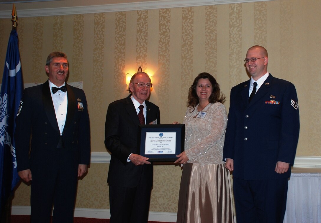 During the S.C. Employer Support of the Guard and Reserve Annual Banquet Staff Sergeant Chris Hopkins, 315th Civil Engineering Squadron, Charleston Air Force Base, S.C., his employer, Dr. Alice Gobeille, from Arvato Services, Inc., was honored with the State Chair "Above and Beyond" award from Joel Cassidy, Chair, SC ESGR Committee.  Also pictured is Senior Master Sergeant Ray D. Eanes, First Sergeant, 315th CES.

This award is given in limited numbers and presented annually by each ESGR Committee.  It is designed to honor the employers of Reserve component members that have gone above and beyond the requirements of the Uniformed Services Employment and Reemployment Rights Act (USERRA) within the district, state, commonwealth, or territory for the calendar year.  (Photo by Debra Baldwin)