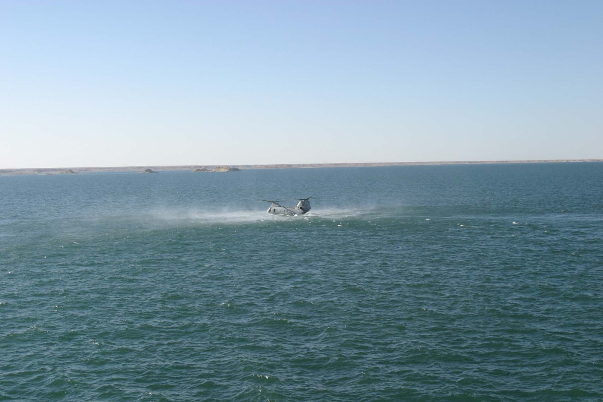 The helicopter, a U.S. Marine C-46 Sea Knight, crash-lands in the rough 52 degree waters of a lake in Iraq, Dec. 3, 2006. Agent Collins, with the help of others, rescued 10 of the passengers. Four others perished. One Marine was recovered from the water but couldn’t be resuscitated and three others, including Agent Collins’ captain, were recovered from the 300-foot deep lake the next day. (U.S. Air Force photo)