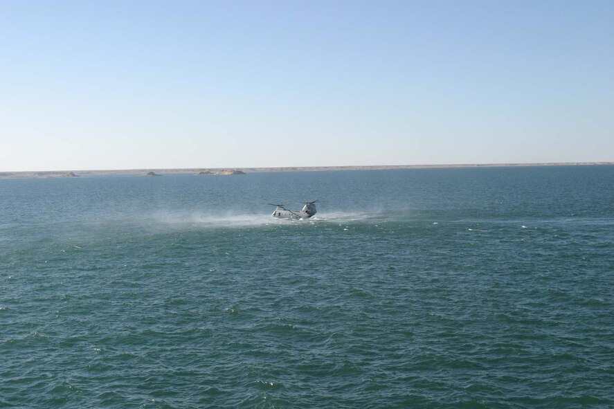 The helicopter, a U.S. Marine C-46 Sea Knight, crash-lands in the rough 52 degree waters of a lake in Iraq, Dec. 3, 2006. Agent Collins, with the help of others, rescued 10 of the passengers. Four others perished. One Marine was recovered from the water but couldn’t be resuscitated and three others, including Agent Collins’ captain, were recovered from the 300-foot deep lake the next day. (U.S. Air Force photo)