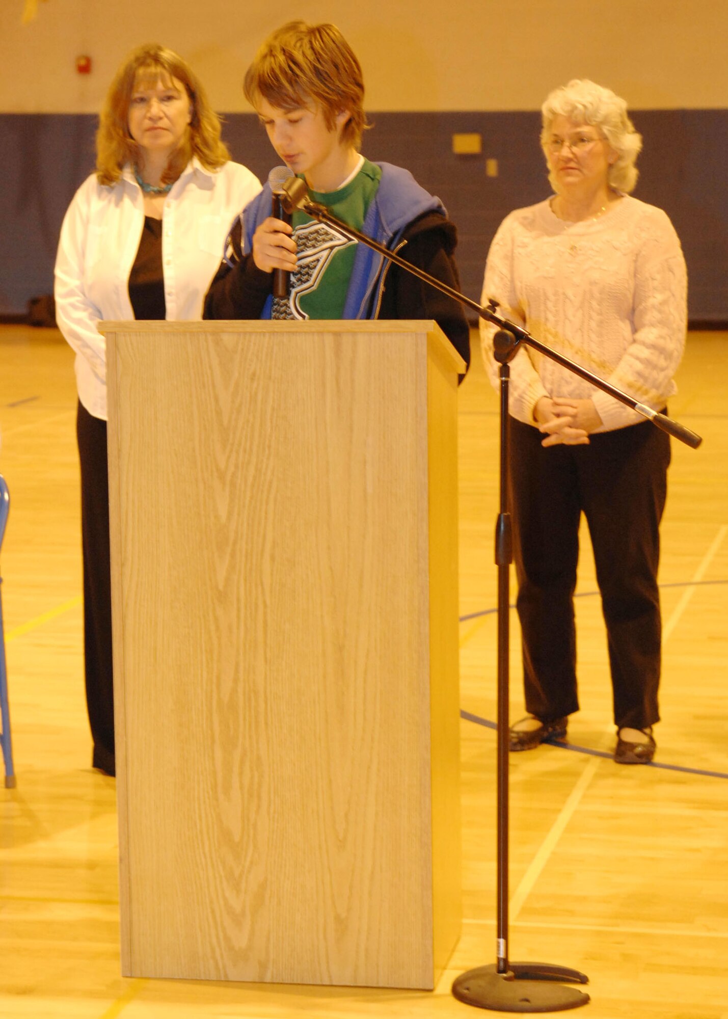A Holloman Middle school student reads his winning essay on Dr. Martin Luther King Jr. Holloman Air Force Base, N.M. on Jan. 25, 2008. This essay was one of the many put on display at the Dr. King Jr. Observance program. (U.S. Air Force photo/Airman 1st Class Rachel A. Kocin)