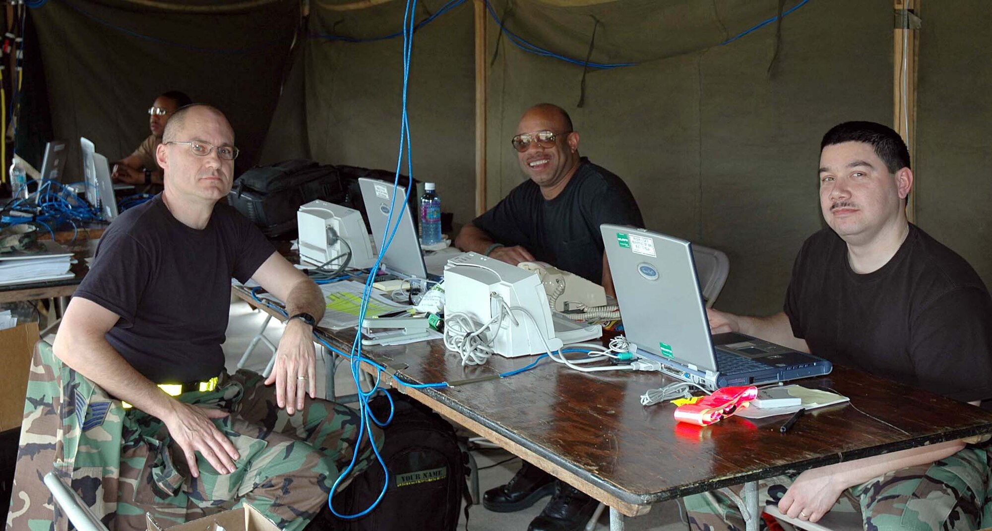 Reservists from the 446th Mission Support Squadron, McChord Air Force Base, Wash., prepare for the next wave of personnel to inprocess at Barking Sands Kuaui for the Pacific Lifeline exercise Jan. 26.  Pacific Lifeline is a humanitiarian disaster response exercise being played out across three island in Hawaii Jan. 26-Feb. 9 with about 900 Department of Defense personnel. (U.S. Air Force photo/Capt. Jennifer Gerhardt)  