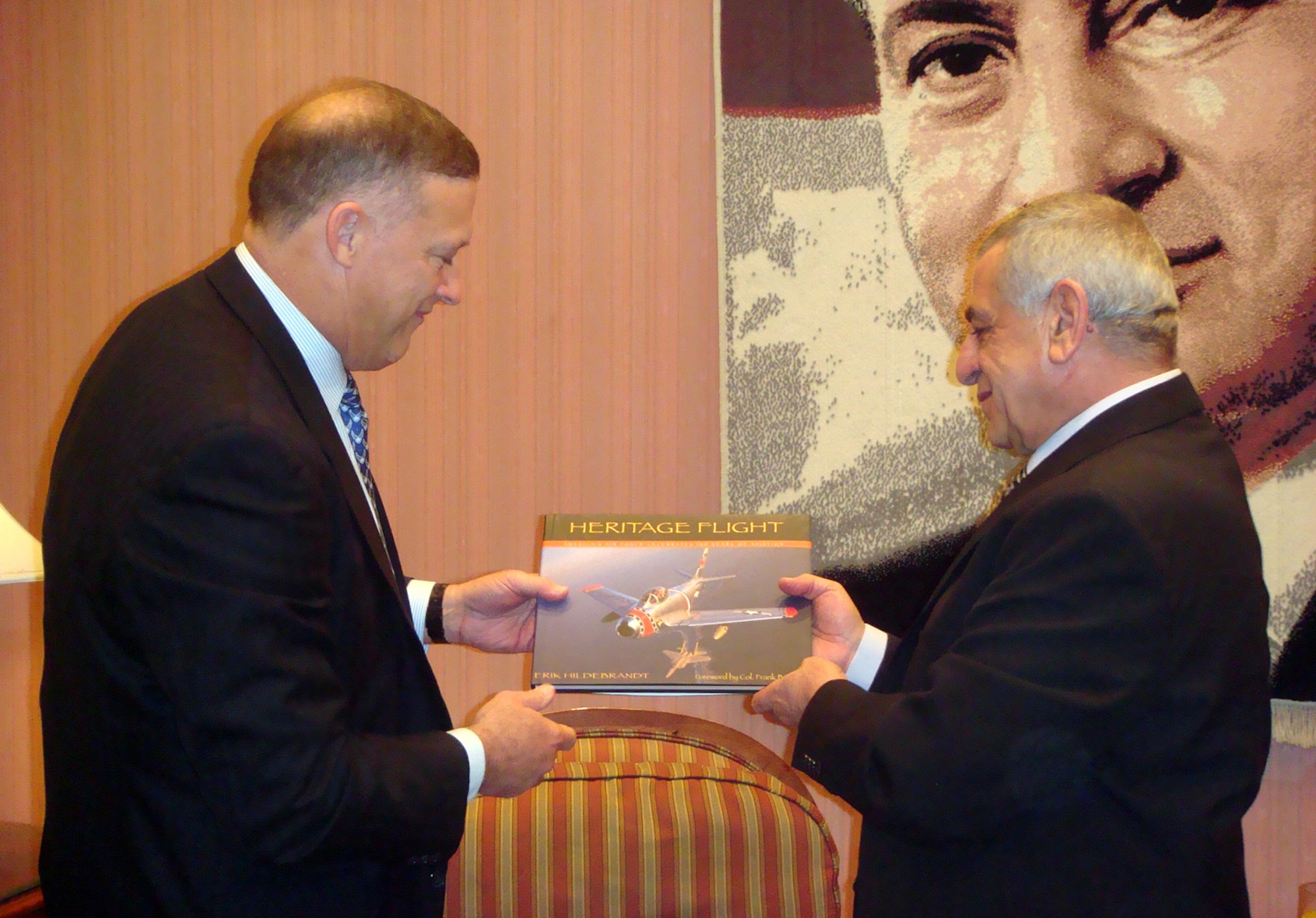 Lieutenant General Gary North, U.S. Central Command Air Forces commander, presents a gift to Air Marshal Magdi Sharawi, Egyptian Air Forces Commander-in-Chief, at the Ministry of Defense in Cairo Jan. 29.
(U.S. Air Force photo by Maj. Mark Visconi)
