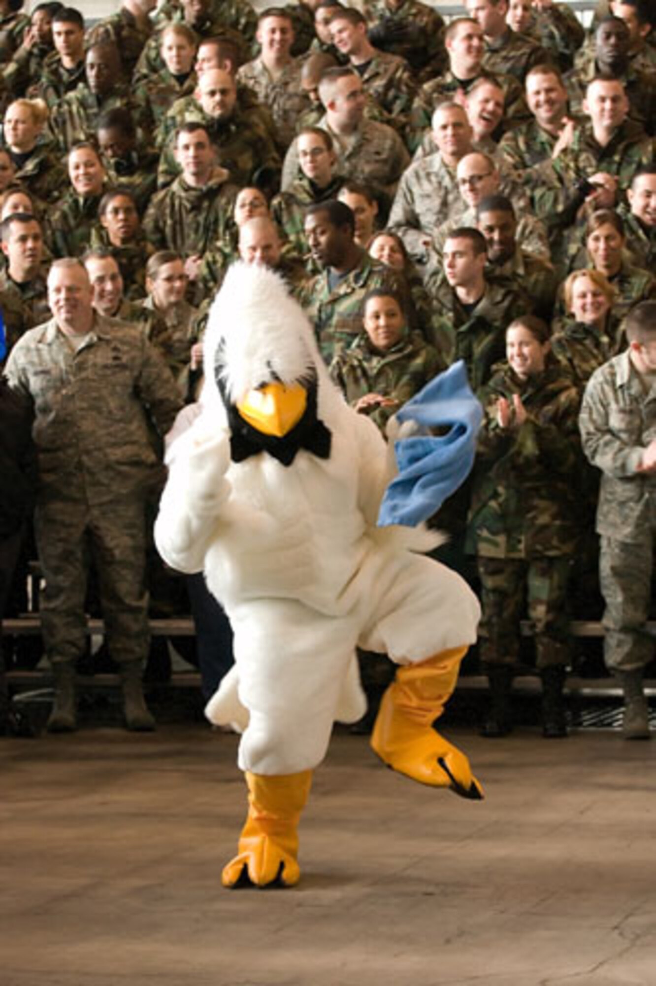 FRED, Team Dover and the Health and Wellness Center mascot, drums up excitement at the 2007 Air Force Commander in Chief's Installation Excellence Award victory rally.  (U.S. Air Force photo/Jason Minto)