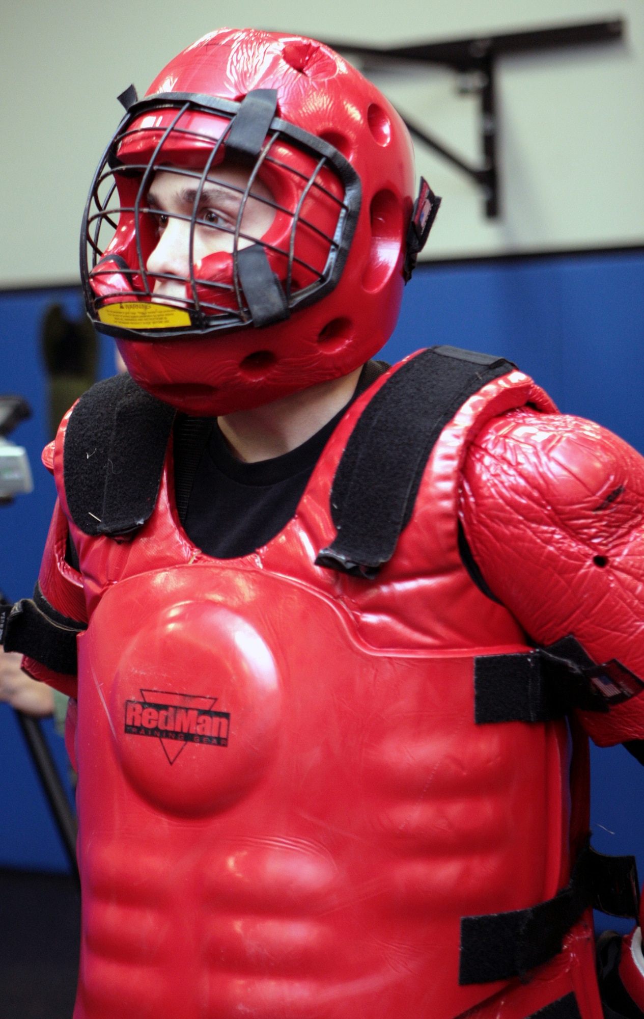 Staff Sgt. Brian Arrington, Raven instructor from the U.S. Air Force Expeditionary Center's 421st Combat Training Squadron, is dressed in the "red man" suit for a Phoenix Raven demonstration at the Center Jan. 22 on Fort Dix, N.J.  (U.S. Air Force Photo/Master Sgt. Bob Lorusso)