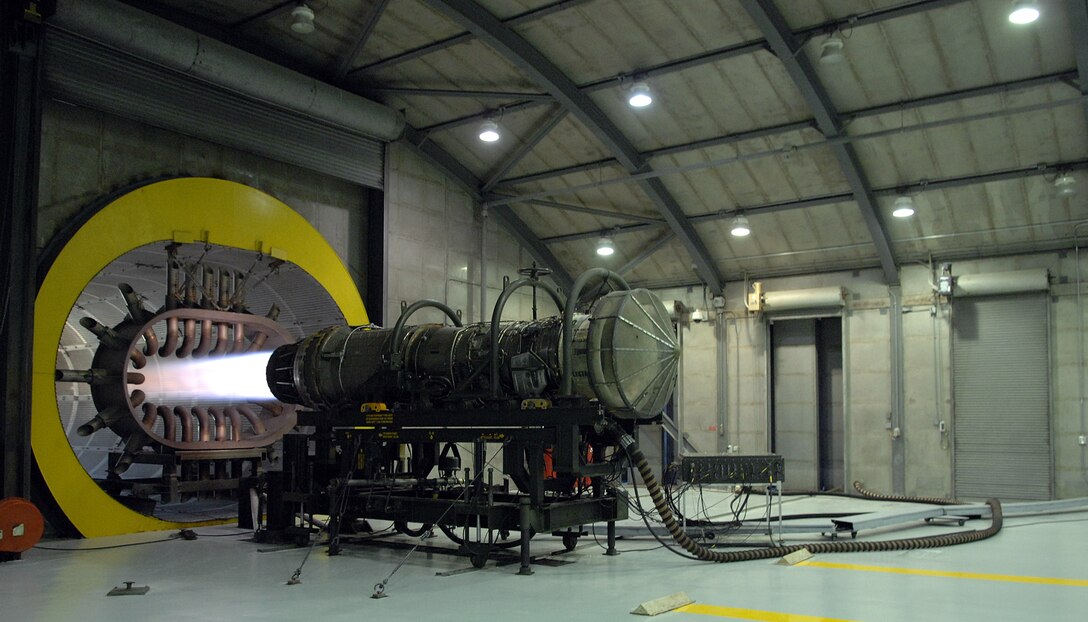 LANGLEY AIR FORCE BASE, Va. -- Airmen of the 1st Component Maintenance Squadron run a test on the final F-100-Pratt Whitney-100 engine at the test cell, or hush house, here Jan. 30. The F100-PW-100 engine is one of the oldest engines used for military operations. After almost four decades of powering the F-15 Eagle, this engine has been replaced with a much stronger engine, the F100-PW-220. (U.S. Air Force photo/Airman 1st Class Vernon Young)