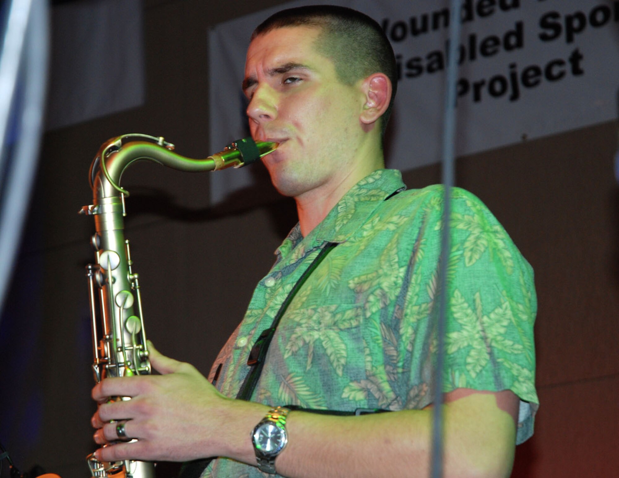A saxophonist with the Air Force band “Pegasus” lays out the tunes for SnoFest attendees during the end-of-SnoFest "Reel Fun" party Jan. 26. SnoFest, held in Keystone, Colo., is an annual ski weekend targeted at military members and their families. Approximately 3,400 servicemembers and their families attended the SnoFest 2008 event. (U.S. Air Force photo/Senior Airman Stephen Collier)
