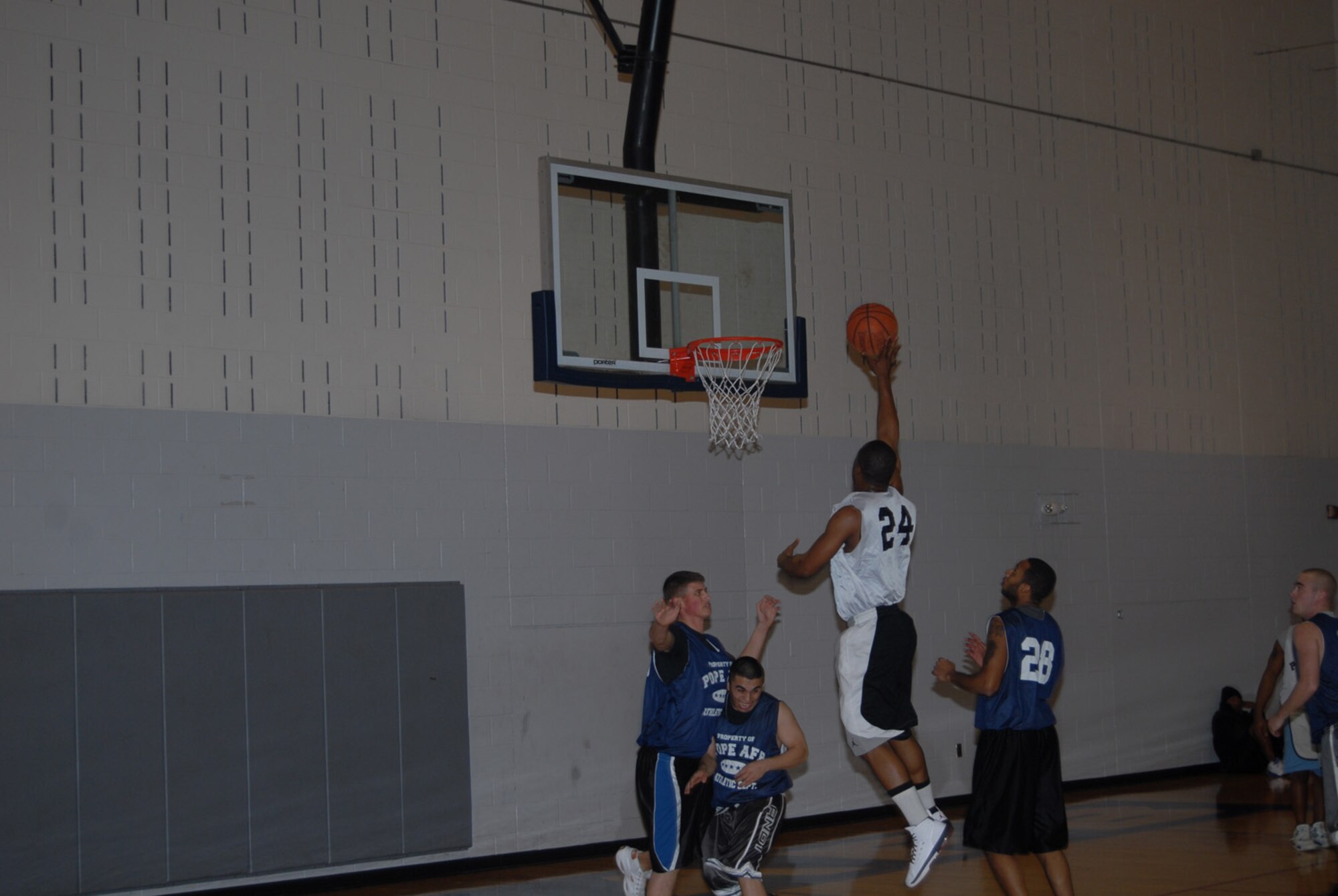 Augustus Williams, 43rd Civil Engineer Squadron, rises up for a shot during his team's 63-32 win over 3rd Aerial Port Squadron (2) Jan. 24. (U.S. Air Force photo/2nd Lt. Chris Hoyler)