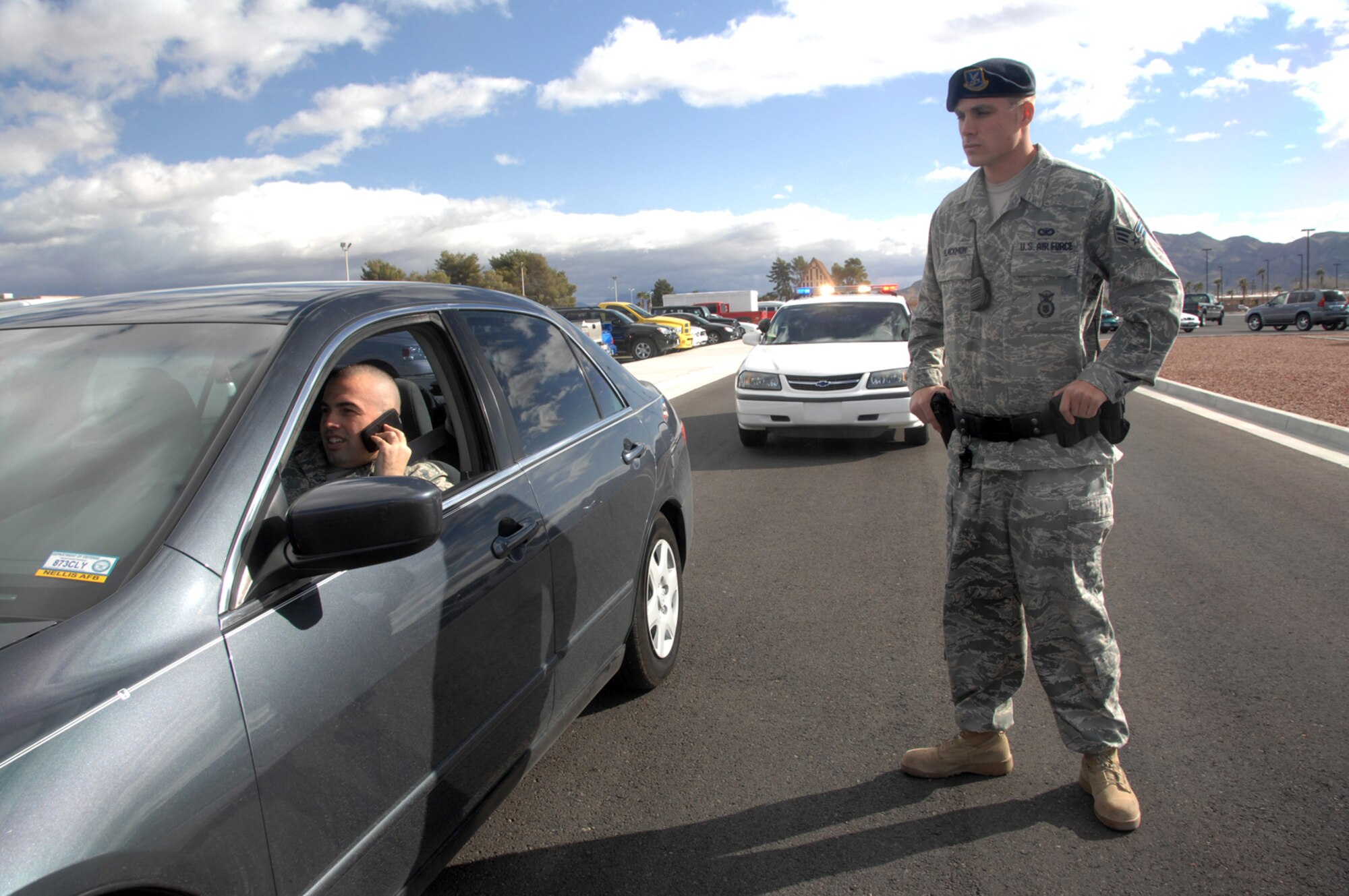 Cell phone use while operating vehicles without the use of a hands-free device is prohibited on all military installations. Air Force policy allows only hands-free cell phone use while driving on an installation. Repeated offenses will cost personnel their driving privileges on base. (U.S. Air Force photo by Staff Sgt. Scottie T. McCord)