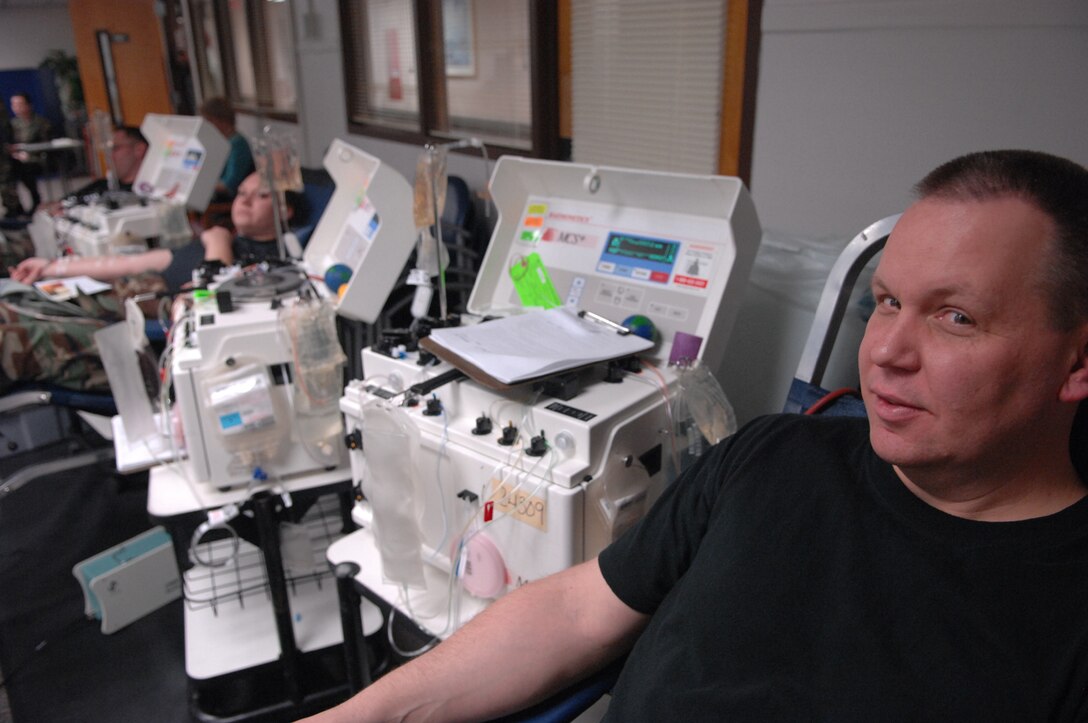 Master Sgt. John Urbas, 28th Medical Operations Squadron Diagnostic Theraputic Flight,  sits and waits for his turn to start donating blood at the 28th Medical Clinic on Jan. 24.  One donor can save two to three lives.  (U.S. Air Force photo by Airman 1st Class Joshua Seybert)