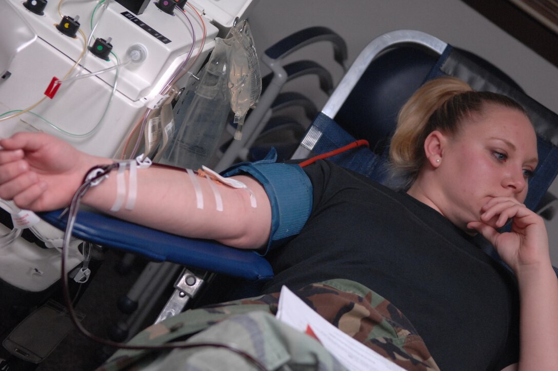 Airman 1st Class Courtney Lemos, 28th Medical Operations Squadron, donates blood at the 28th Medical Clinic Jan 24. One donor can save two to three lives.  (U.S. Air Force photo by Airman 1st Class Joshua Seybert)