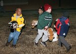 Children from Lackland Elementary School ride toy horses at the Lackland Independent School District's Cowboy Breakfast on Jan. 25. (USAF photo by Robbin Cresswell)