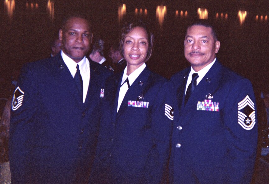 Members of the 301st Logistics Readiness Squadron, Naval Air Station Joint Reserve Base Carswell Field, Texas, surround Tech. Sgt. MaNeka Morrison after her win as the 301st Fighter Wing's 2007 NCO of the Year. (U.S. Air Force Photo)