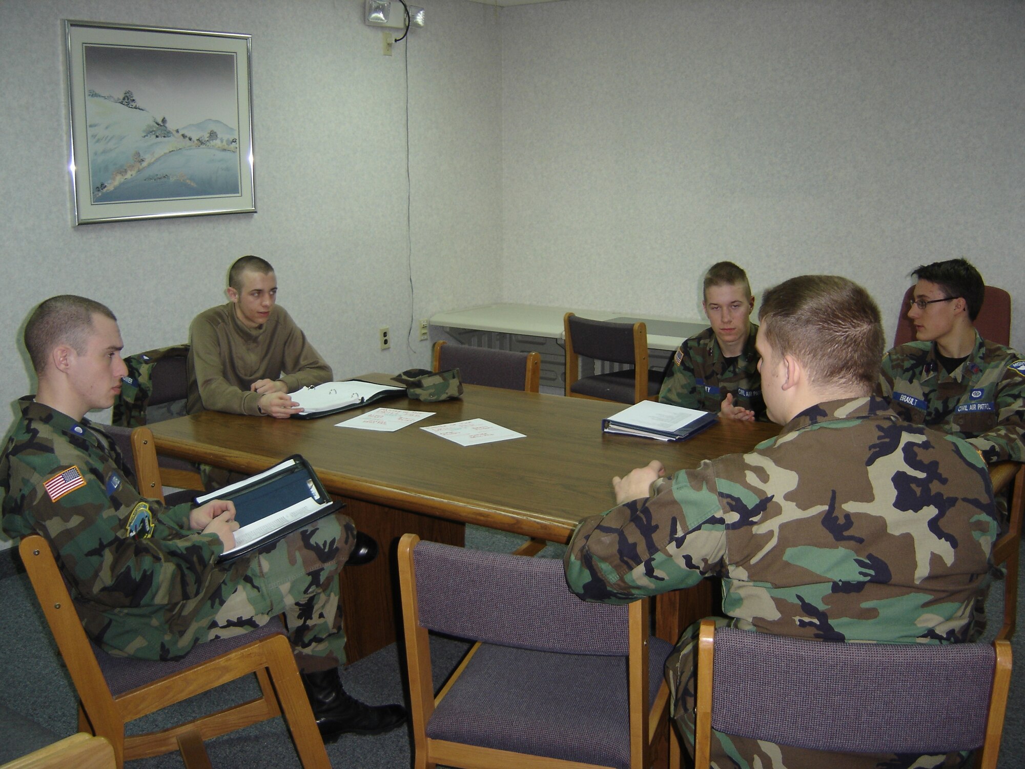 Senior Civil Air Patrol cadets gather after other cadets have gone to bed to discuss future activities and the days events. CAP held an encampment at Malmstrom Jan. 11 to 27. (Courtesy photo)