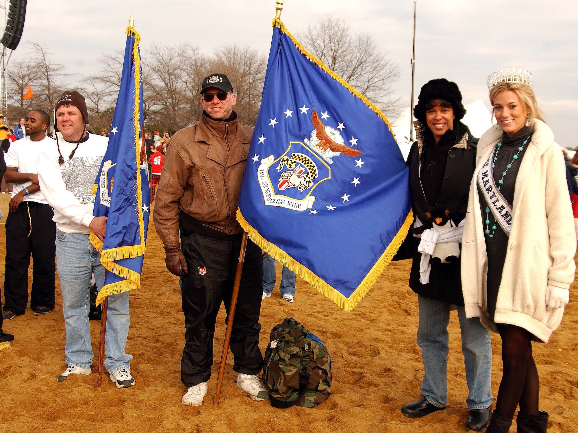 ANNAPOLIS, Md. -- (From left) Cedric Quick, contractor, stands next to Tech. Sgt. Warren Hiller, 459th Aircraft Maintenance Squadron, Lt. Col. David Post, 459th Maintenance Group, Col. Stayce D. Harris, 459th Air Refueling Wing commander, and Cassandra Tressler, Miss Maryland U.S.A. 2008. Team Andrews members of the 459th Air Refueling Wing and the 79th Medical Wing were among nearly 9,000 people who hopped into the Chesapeake Bay during the Maryland State Police Polar Bear Plunge at Sandy Point Park to raise money for Special Olympics Maryland. Sergeant Hiller's team, Crazy Yankee, raised more than $1,300 in donations. (U.S. Air Force photo/Staff Sgt. Amaani Lyle)