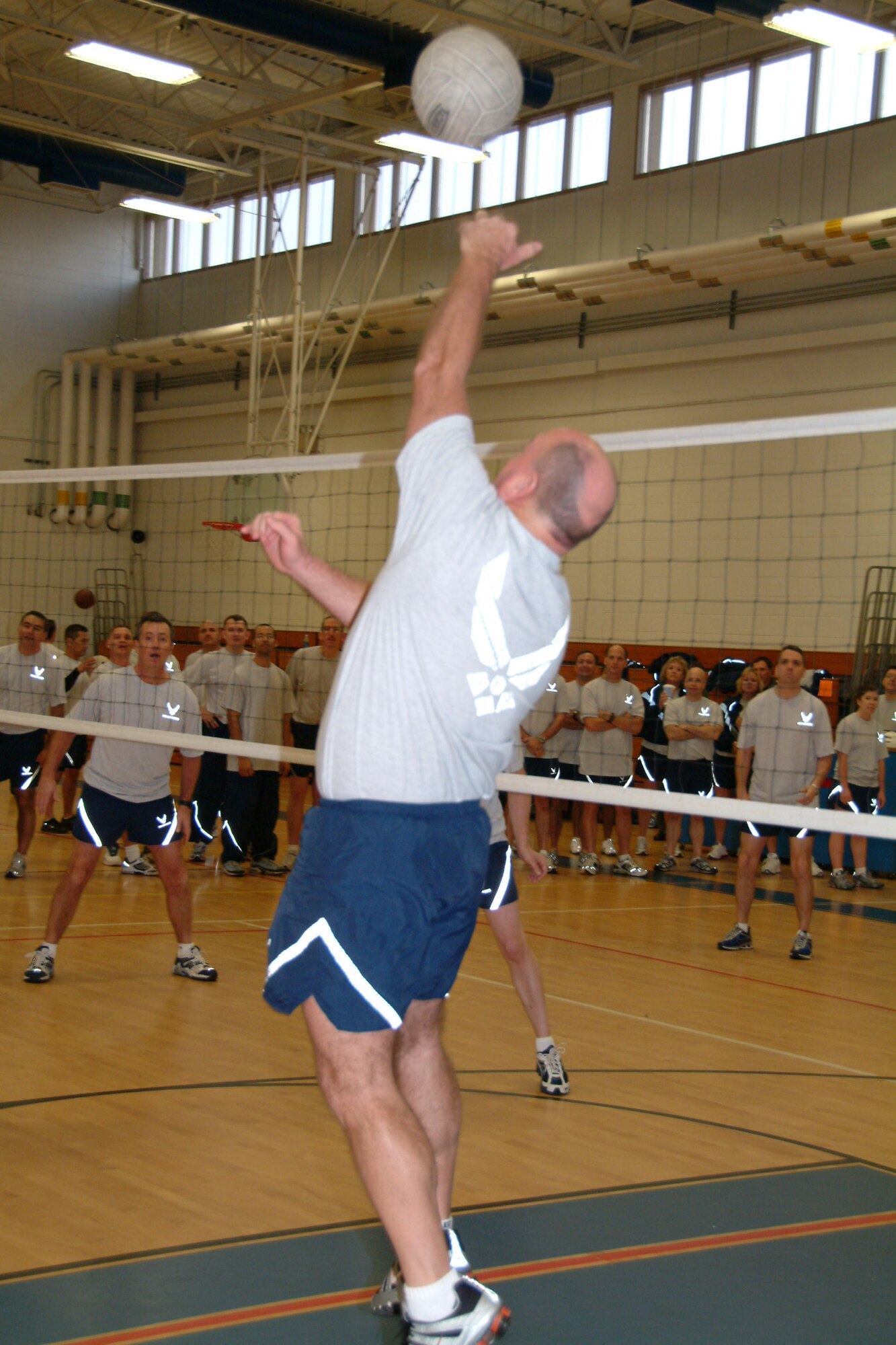 Members of the 53d Electronic Warfare Group met the 53d Test Management Group in a championship game during a volleyball outing on the eve of the wing’s annual awards banquet.  The EWG overcame a loss earlier to win back-to-back games against the TMG to take the championship.  All of the groups participated in the event.  Air Force photo by Staff Sgt. Samuel King Jr.