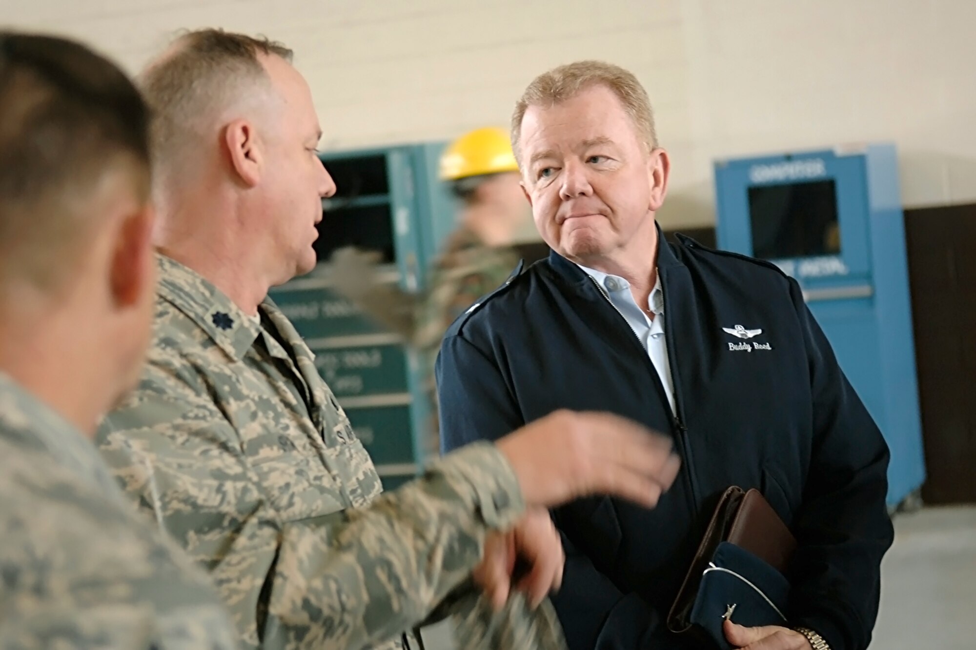 Brig. Gen. Charles Reed, Mobilization Assistant to the Commander, 18th Air Force, talks with Lt. Col. Benjamin Snow, 43rd Maintenance Squadron Commander, during his visit to Pope Tuesday morning. General Reed was at Pope to observe the ongoing changes due to the Base Realignment and Closure Act. (U.S Air Force photo/Mike Murchison)