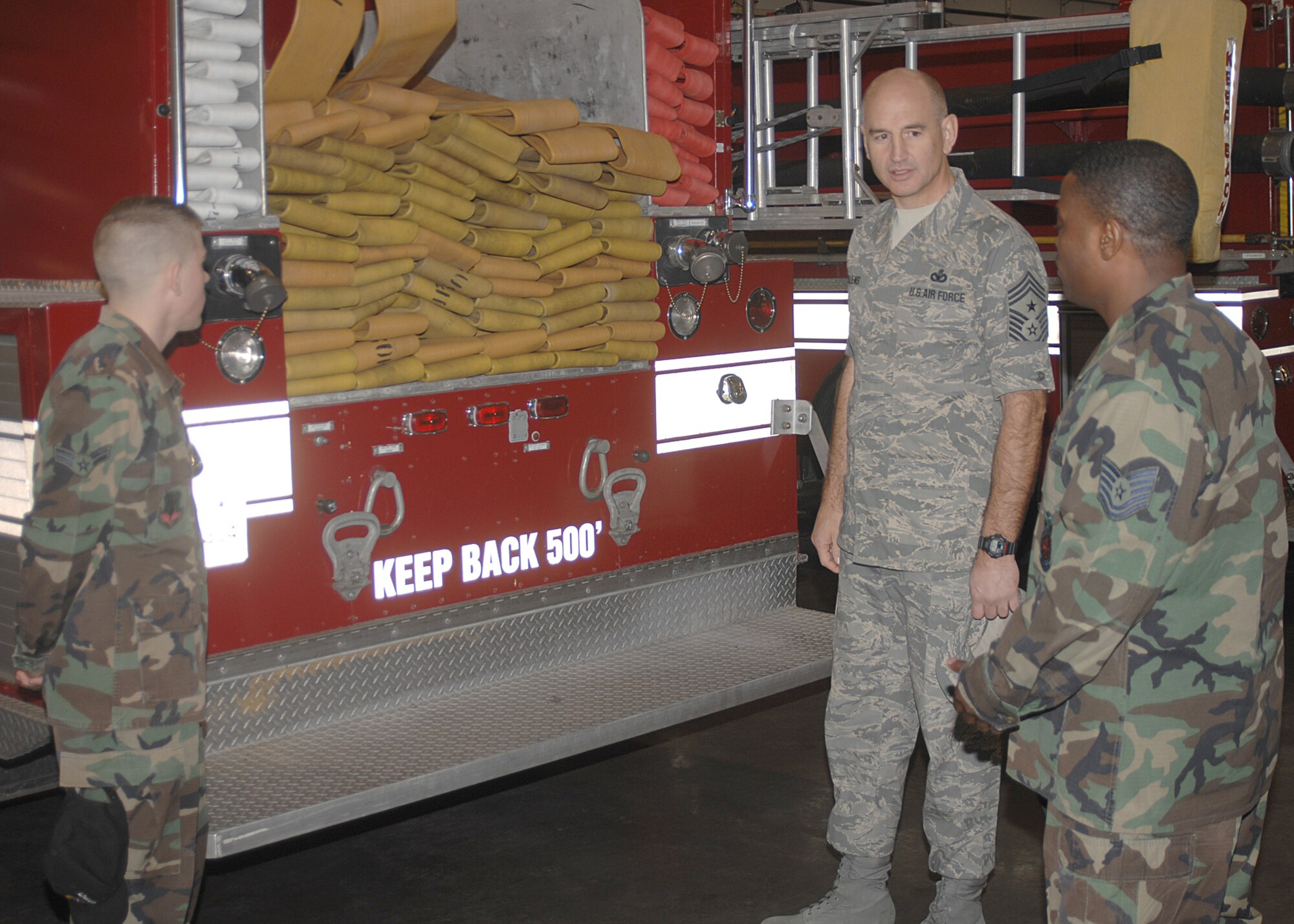 SEYMOUR JOHNSON N.C. - Chief Master Sergeant Steve Sullens, Air Combat Command Command Chief, talks with Airman First Class Garrett Heaton and Technical Sergeant Alexander Jones, both 4th Civil Engineering Squadron, about the new firefighter station during his visit to Seymour Johnson AFB, N.C. Saturday January 26, 2008.(US Air Force photo by SrA Chad Trujillo)(released)