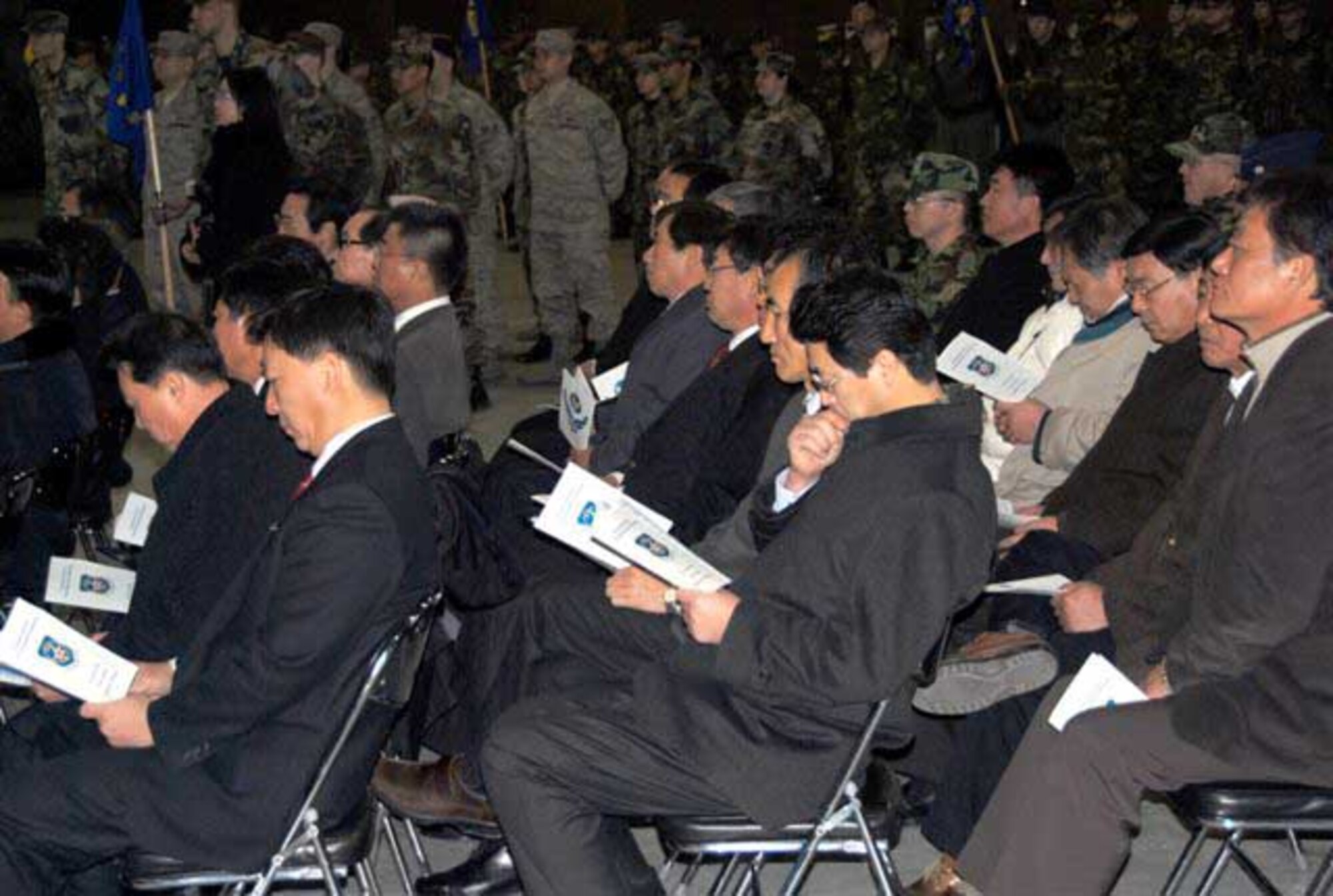 Honorary commanders listen to speakers during the Seventh Air Force’s Redesignation Ceremony Jan. 30. The new Seventh Air Force (Air Forces Korea) organization will provide the United States Forces Korea commander with critical air component capabilities, ensuring a key element of joint and combined operations on the Korean peninsula. (U.S. Air Force photo)