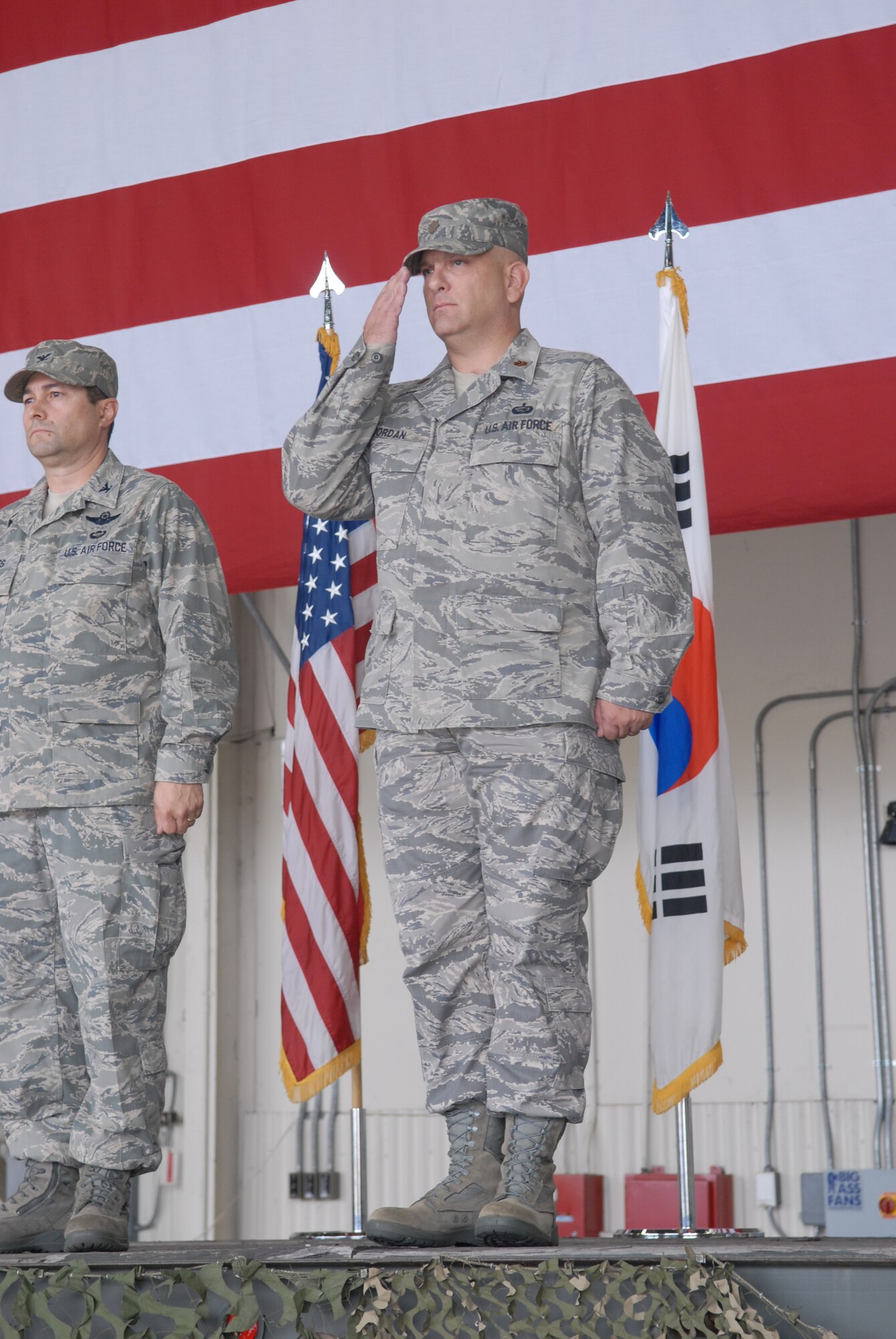 Maj. Stephen Jordan, 8th Force Support Squadron commander, receives his first salute during the 8th FSS activation ceremony here June 30. Both the 8th Services Squadron and 8th Mission Support Squadron were inactivated as the 8th FSS stood up.