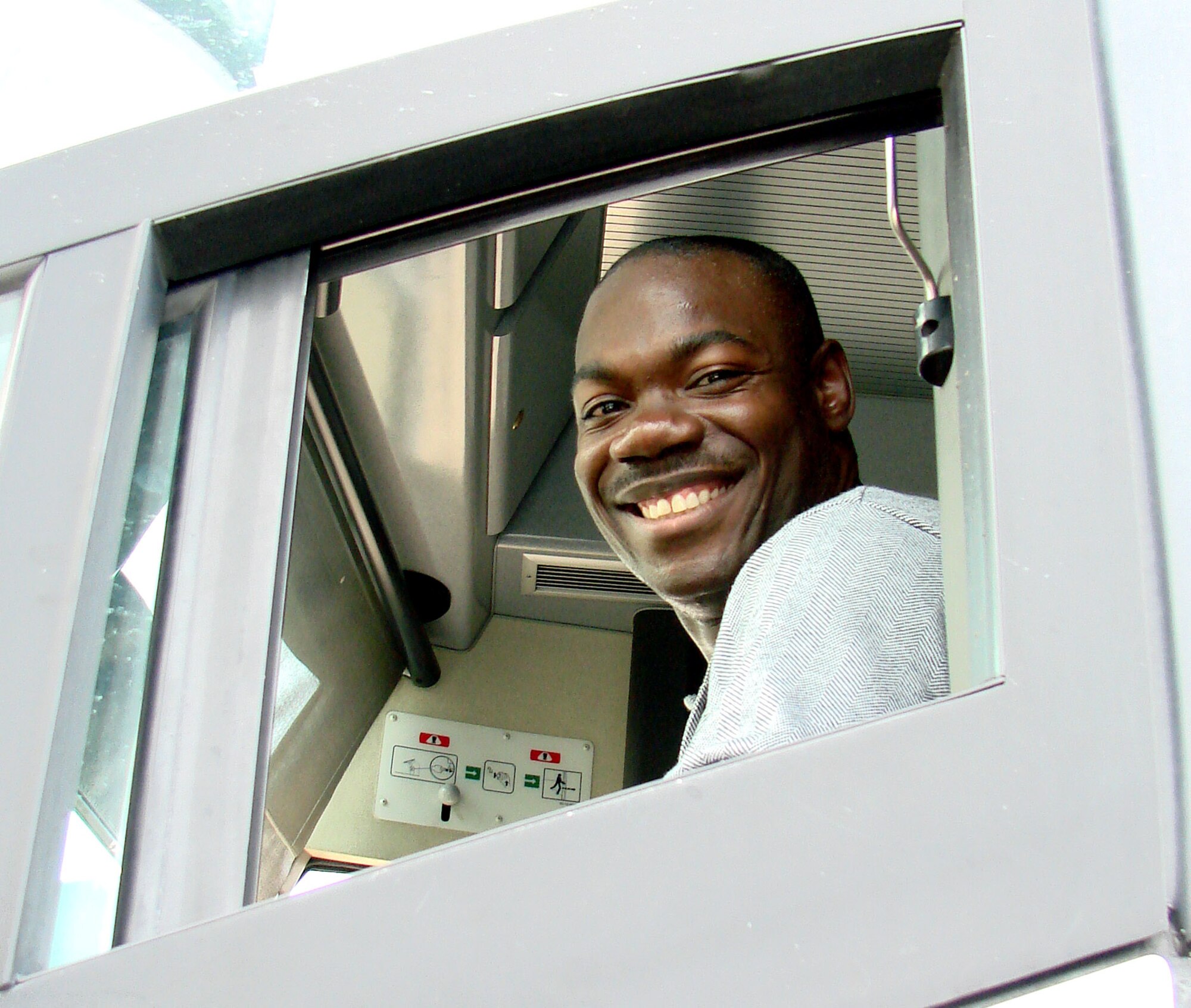 Master Sgt. Reginald Booker is the NCO in charge of transportation and the first sergeant of the 2008 Tops in Blue entertainment group. His wife, Ada Booker, is the Non-appropriated Funds Human Resources Officer at Vance AFB in Enid, Okla. Tops in Blue performed June 29 at the Chisholm Trail Expo Center in Enid. (U.S. Air Force photo by Joe B. Wiles)   