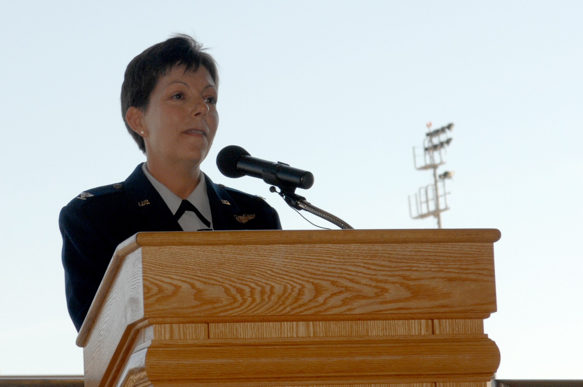 WHITEMAN AIR FORCE BASE, Mo., -- Col. Kathleen M. Dunn-Cane speaks to Team Whiteman members after assuming command of the 509th Medical Group from Col. Gloria Twilley during a change of command ceremony June 30. (U.S. Air Force photo/Senior Airman Jessica Snow)