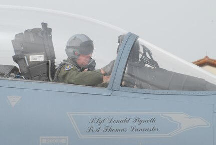 Gen. William R. Looney, Commander, Air Education and Training Command, was honored by fellow Airmen, friends and family during his final, or "fini," flight July 1. General Looney selected an F-15 aircraft as his last flight and was honored by firefighters dousing him with hundreds of gallons of water and friends and family showering him with warm wishes for his retirement. (U.S. Air Force photo by Rich McFadden)