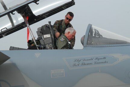 Gen. William R. Looney, Commander, Air Education and Training Command, was honored by fellow Airmen, friends and family during his final, or "fini," flight July 1. General Looney selected an F-15 aircraft as his last flight and was honored by firefighters dousing him with hundreds of gallons of water and friends and family showering him with warm wishes for his retirement. (U.S. Air Force photo by Rich McFadden)
