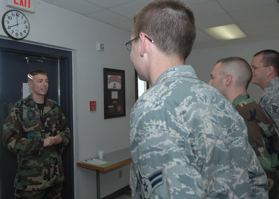 WHITEMAN AIR FORCE BASE, Mo., -- 2nd Lt. Joshua Heacock, 509th Aircraft Maintenance Squadron aircraft section officer in charge, briefs members of his staff prior to starting their daily duties. (U.S. Air Force photo/Senior Airman Dilia Ayala)