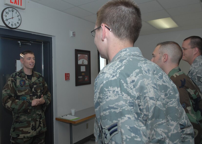 WHITEMAN AIR FORCE BASE, Mo., -- 2nd Lt. Joshua Heacock, 509th Aircraft Maintenance Squadron aircraft section officer in charge, briefs members of his staff prior to starting their daily duties. (U.S. Air Force photo/Senior Airman Dilia Ayala)