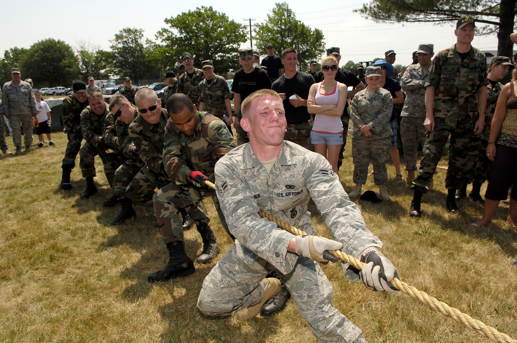 Members from the 818th Global Mobility Readiness Squadron, compete in tug-of-war during the 621st Contingency Response Wing Combat Field Day June 27 here. The field day consisted of numerous events, including the ruck-sack relay, tent building and an obstacle course. (U.S. Air Force photo/Kenn Mann)