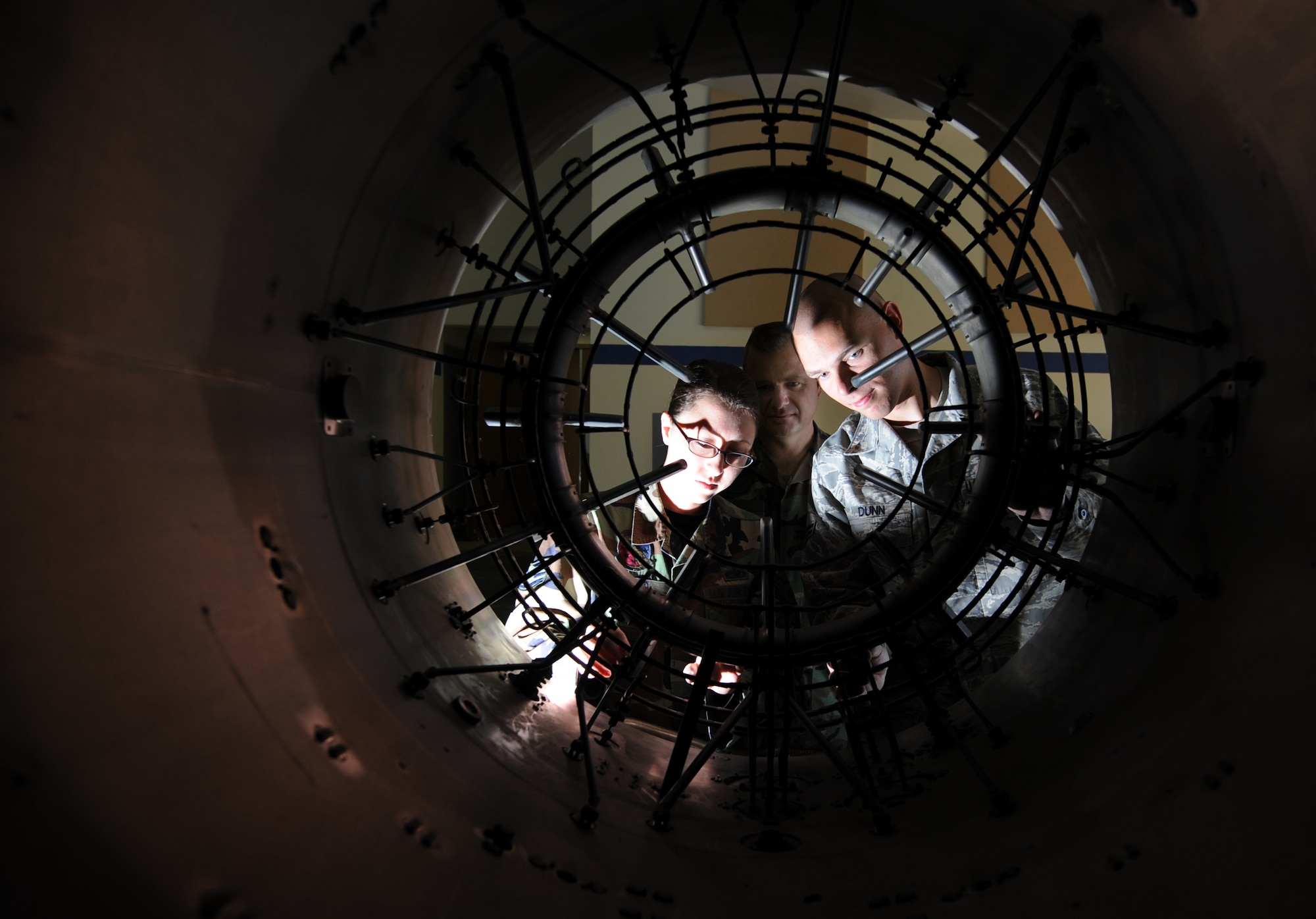 MOUNTAIN HOME AIR FORCE BASE, Idaho -- Staff Sgt. Virginia Munro and Airman 1st Class Ralph Dunn, 366th Component Maintenance Squadron propulsion shop, train on an F15 aircraft engine as Master Sgt. Tad Russell, 372nd Training Squadron instructor, supervises their progress at the 372nd TRS detachment June 27.  The 372nd TRS, based out of the 982nd Training Group at Sheppard Air Force Base, Texas, teaches more than 50 different courses to seven maintenance career fields. As part of the Air Education and Training Command, the squadron's courses act as required steps in gaining five- or seven-level certification, and all are Community College of the Air Force accredited. (U.S. Air Force photo/ Airman 1st Class Stephany Miller)