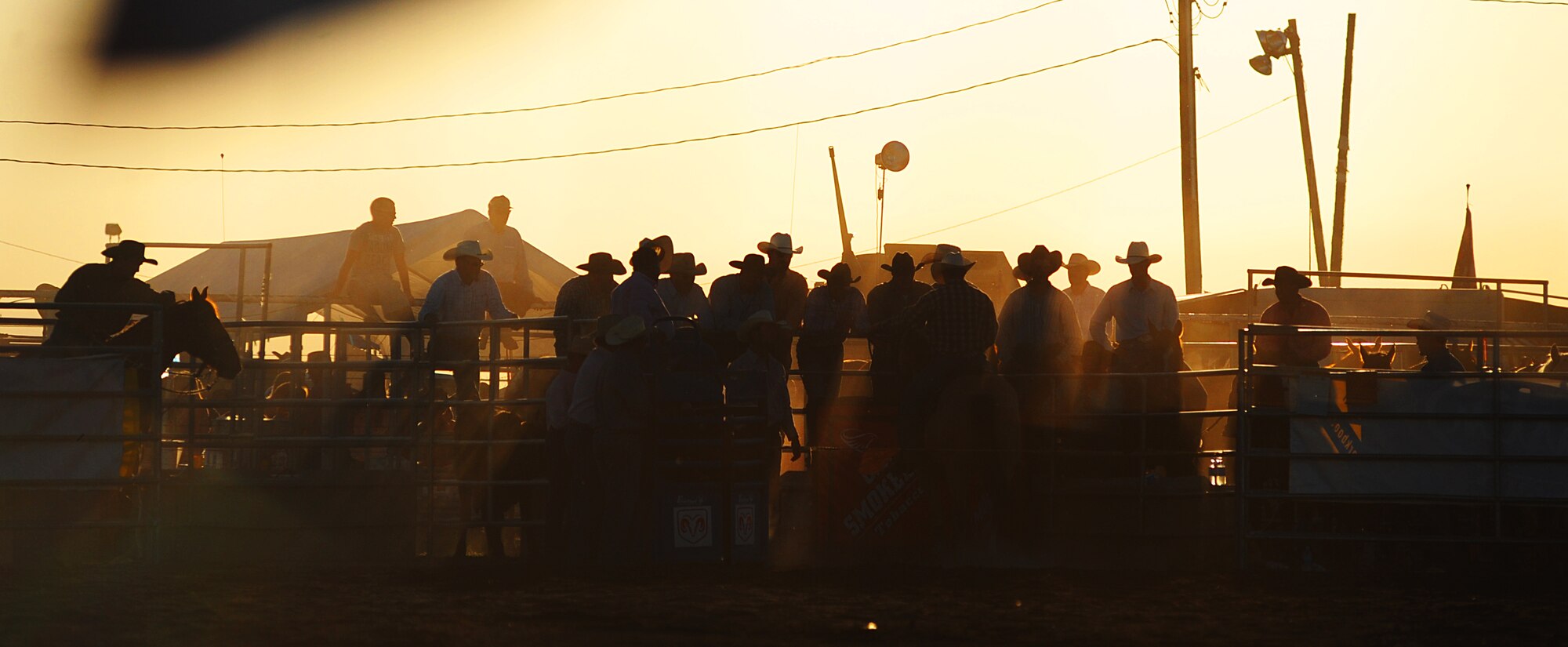 MOUNTAIN HOME AIR FORCE BASE, Idaho -- Riders from the Professional Rodeo Circuit await their turns in the calf wrangling event during the third annual Daniel Dopps Memorial Rodeo at Optimist Park June 28. Daniel, a Gunfighter who passed away Aug. 7, 2005, died from injuries sustained Aug. 6, 2005, at a Professional Rodeo Cowboys Association event at the age of 19 while assigned to the 366th Civil Engineer Squadron. People from around the Mountain Home community attended this event to support Daniel's family and to enjoy a night of rodeo excitement. (U.S. Air Force photo/ Airman 1st Class Ryan Crane) 