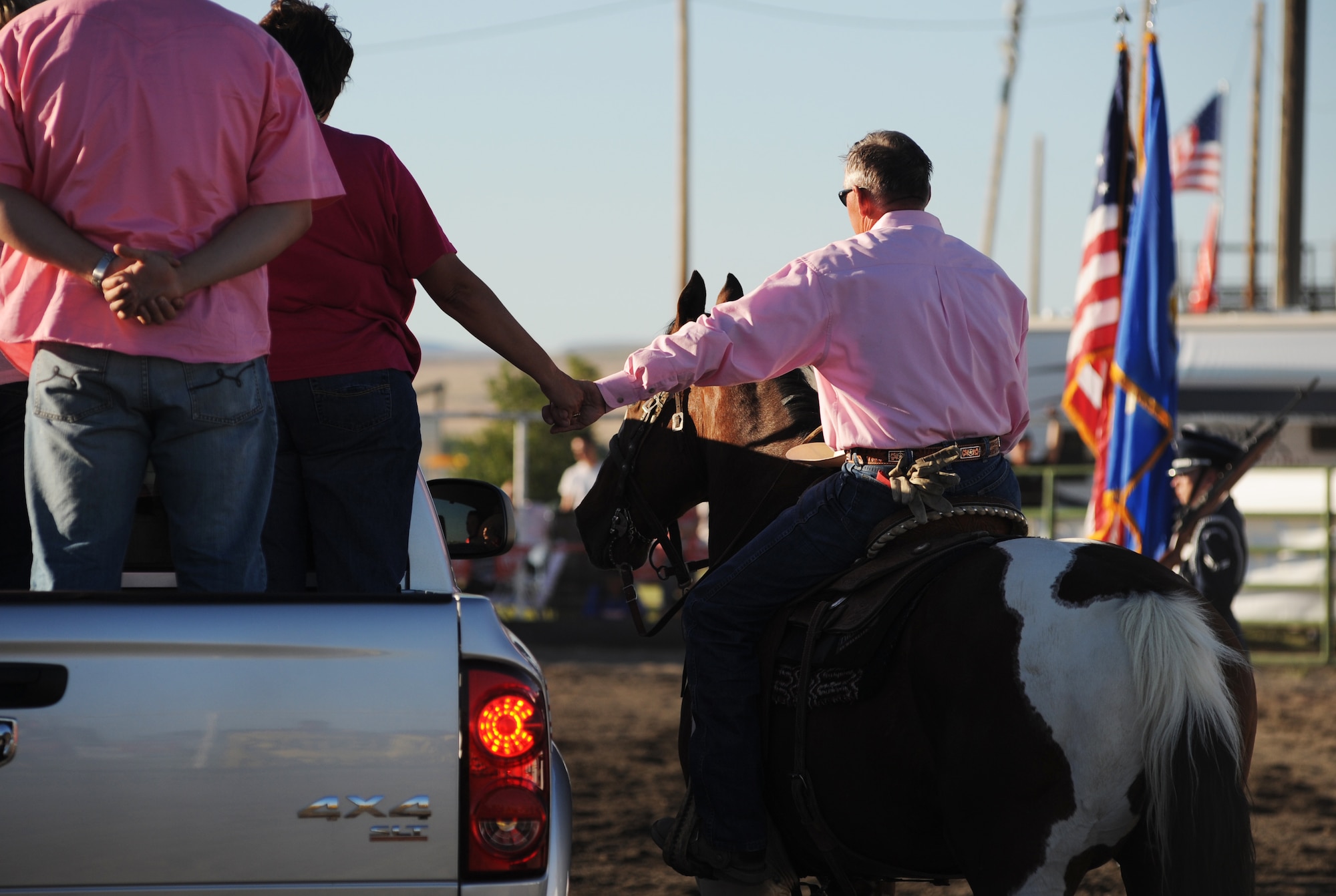 MOUNTAIN HOME AIR FORCE BASE, Idaho -- Daniel Dopps' family arrives at the third annual Daniel Dopps Memorial Rodeo at Optimist Park to honor the memory of Daniel, a Gunfighter who passed away Aug. 7, 2005. Daniel died from injuries sustained Aug. 6, 2005, at a Professional Rodeo Cowboys Association event at the age of 19 while assigned to the 366th Civil Engineer Squadron. People from around the Mountain Home community attended this event to support Daniel's family and to enjoy a night of rodeo excitement. (U.S. Air Force photo/ Airman 1st Class Ryan Crane)