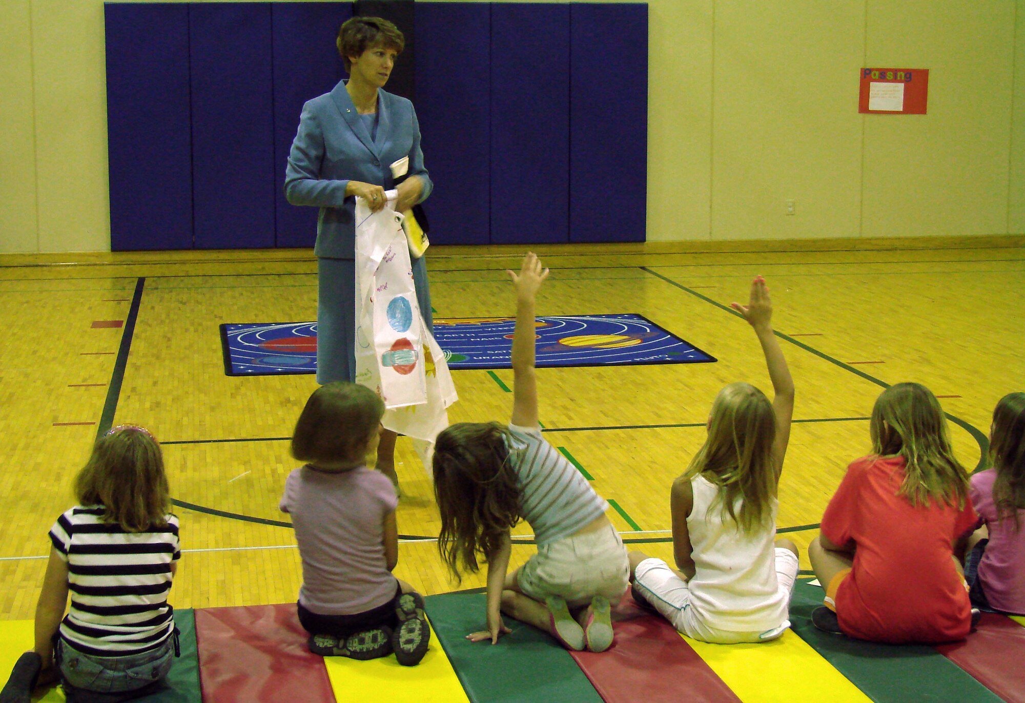 Retired Air Force Col. Eileen Collins, a former astronaut from NASA and a 1979 first assignment instructor pilot at Vance AFB, Okla. visits the Youth Center to talk with a young audience about her career. (U.S. Air Force photo by Joe Wiles)