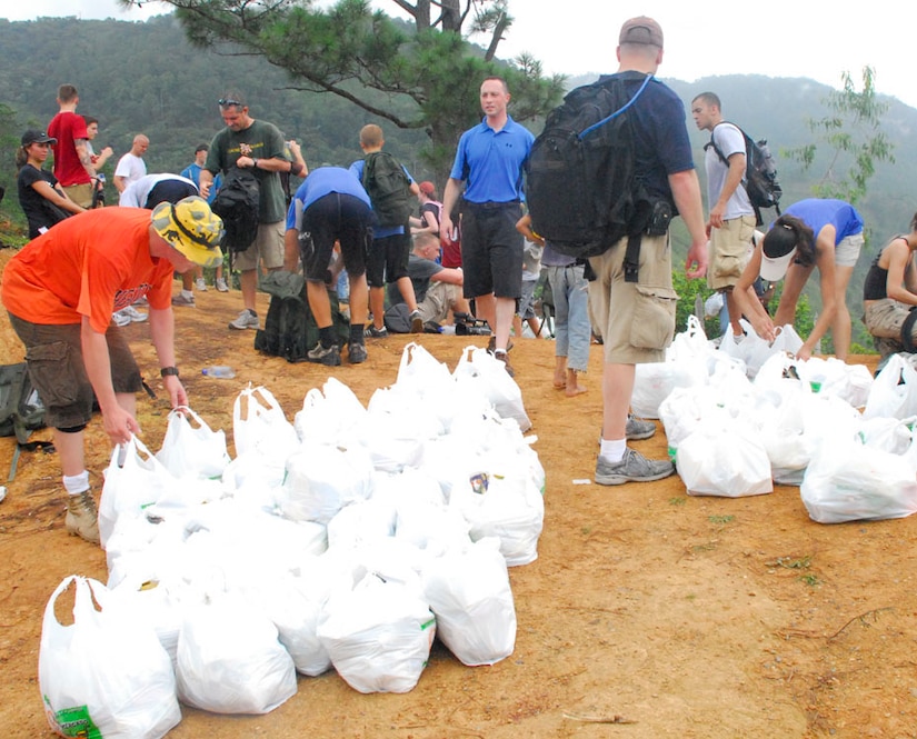 SOTO CANO AIR BASE, Honduras?Joint Task Force-Bravo personnel stage an area for distributing the food they hauled to up the mountain sides for the residents of the tiny village of Picacho, Honduras. The grocery bags contained simple, but greatly appreciated staples such as flour, cooking oil, powdered eggs and milk and canned goods. (U.S. Air Force photo by Tech. Sgt. William Farrow)