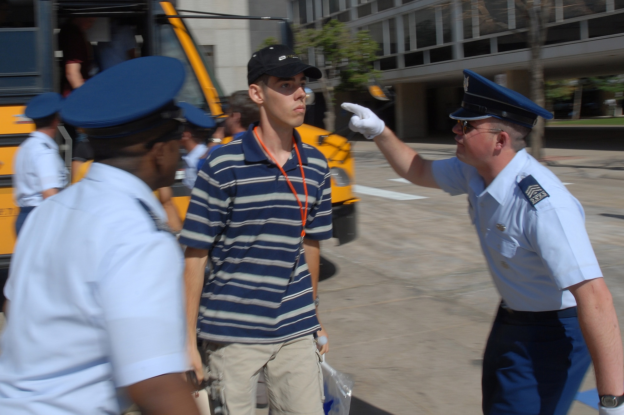 A basic cadet is welcomed to the Core Values Ramp after exiting a bus during inprocessing as the Class of 2012. June 26 at the U.S. Air Force Academy, Colo. Inprocesing marks the start of 38 days of Basic Cadet Training, which is designed to prepare basic cadet trainees for entry into the cadet wing. (U.S. Air Force photo/David Armer)