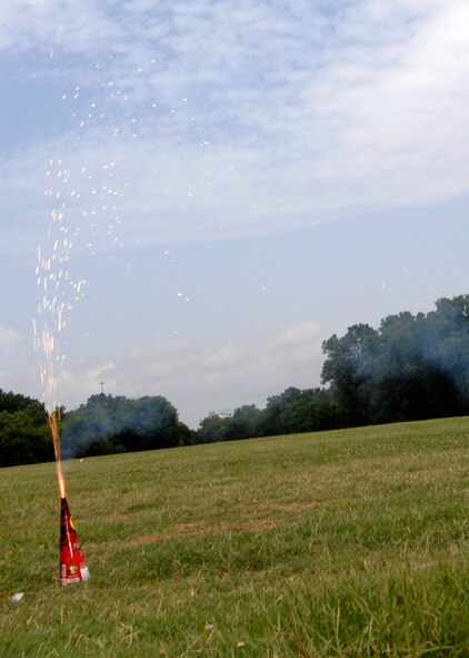 SHREVEPORT, La. - Members of the Air Force practice fireworks safety outside Barksdale Air Force Base prior to the Fourth of July. Remember to give your Airmen a safety briefing prior to the holiday weekend. (U.S. Air Force photo by Airman 1st Class Joanna M. Kresge)