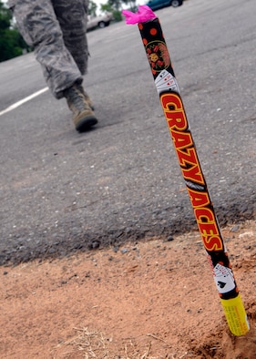 SHREVEPORT, La. - Members of the Air Force practice fireworks safety outside Barksdale Air Force Base prior to the Fourth of July. Remember to give your Airmen a safety briefing prior to the holiday weekend. (U.S. Air Force photo by Airman 1st Class Joanna M. Kresge)