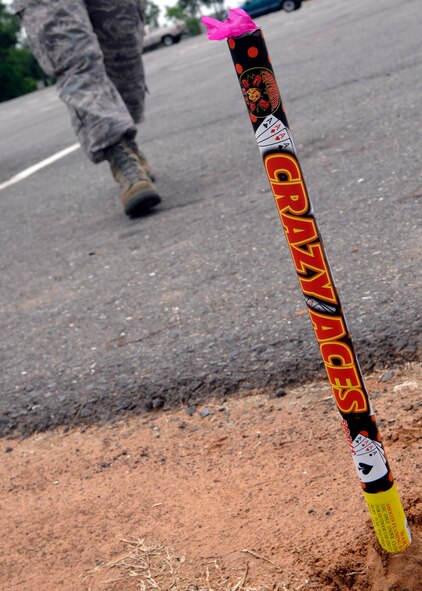 SHREVEPORT, La. - Members of the Air Force practice fireworks safety outside Barksdale Air Force Base prior to the Fourth of July. Remember to give your Airmen a safety briefing prior to the holiday weekend. (U.S. Air Force photo by Airman 1st Class Joanna M. Kresge)