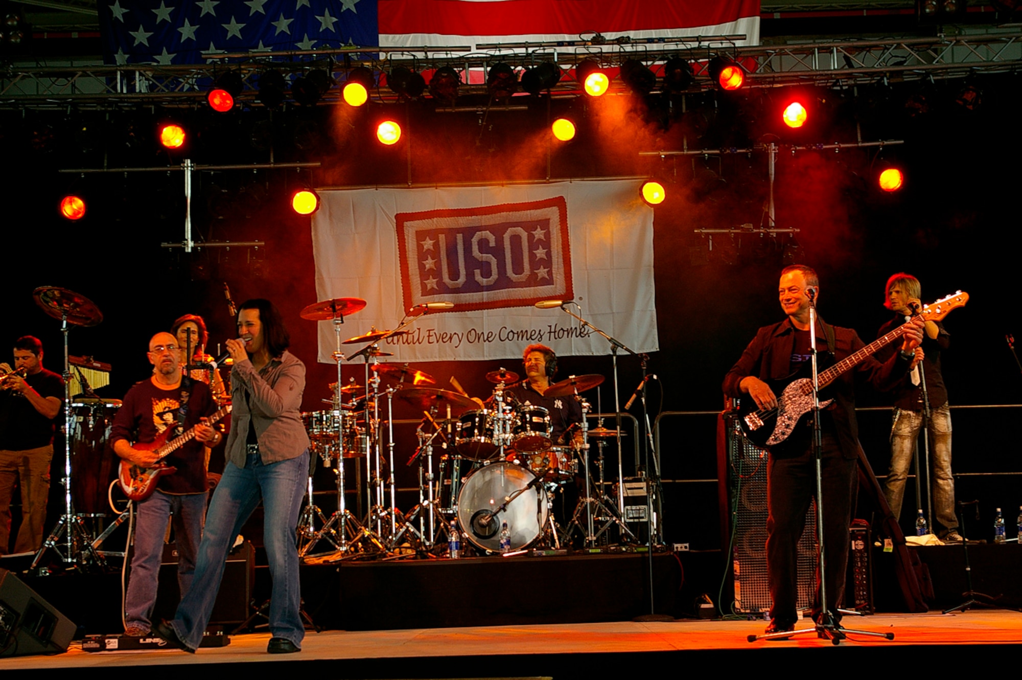 The Lt. Dan Band, named after Actor Gary Sinise's character in "Forrest Gump", played in Hangar 539 at RAF Mildenhall June 29. Mr. Sinise plays bass guitar in the band which was here as part of a United Services Organization tour, playing to servicemembers around the world to show their support for them. Approximately 650 people watched the concert as the Lt. Dan Band interacted with the crowd and kept everyone entertained for the two-hour show. (U.S. Air Force photo by Karen Abeyasekere)
