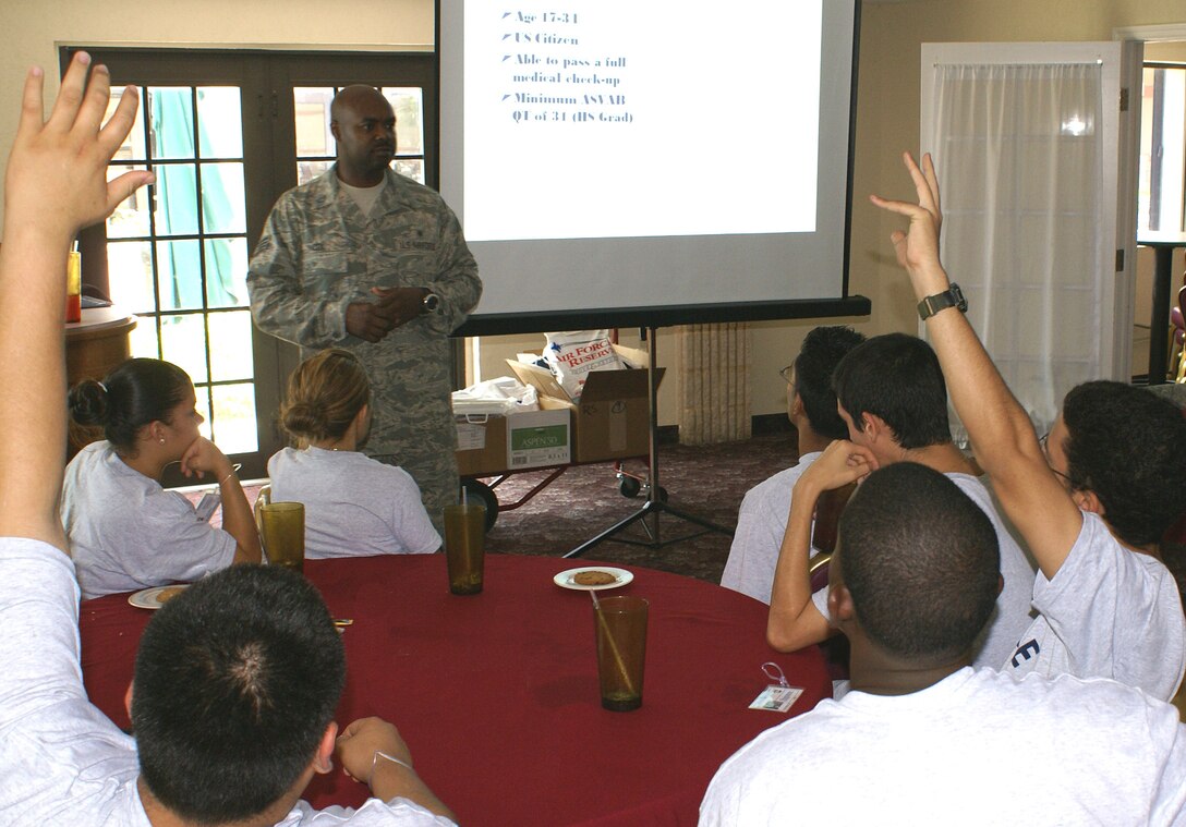 Staff Sgt. Horace Cox, 482nd Fighter Wing recruiter, talks to Homestead High School Air Force Junior ROTC cadets after a base tour on June 17. The 482nd FW’s recruiting efforts extend throughout Miami-Dade, Broward and Monroe Counties in search of the Citizen Airmen of tomorrow. The wing operates offices at Homestead ARB and in the Cities of Doral, Lauderhill and Hialeah. (U.S. Air Force photo)