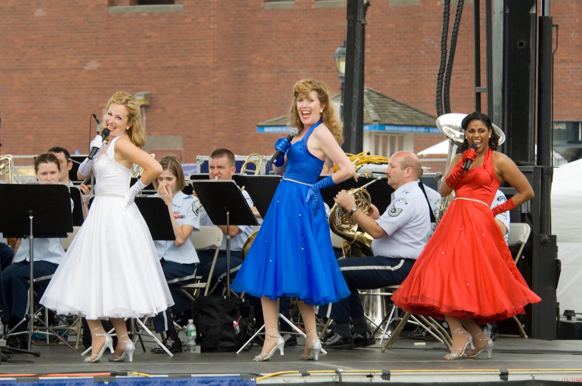 BOSTON, Mass. -- The American Belles perform alongside the Air Force Band of Liberty’s Concert Band during the ParkARTS concert series at Columbus Park in Boston June 28. The afternoon featured tunes from the World War II era as well as popular military marches. (U.S. Air Force photo by Rick Berry.)