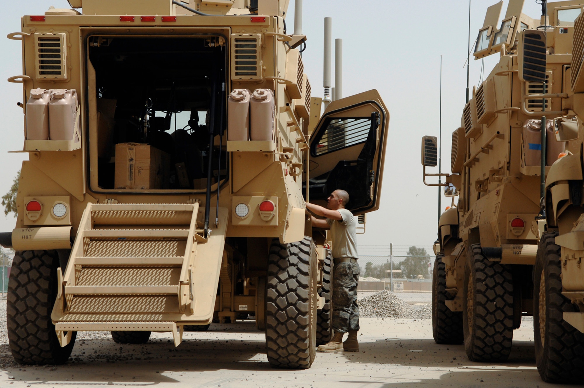 JOINT BASE BALAD, Iraq -- Airman 1st Class Jared Lucci, 332nd Expeditionary Logistics Readiness Squadron vehicle maintainer, performs an acceptance limited technical inspection on a Mine Resistant Ambush Protected armored vehicle here, June 28. The inspection ensures that all the systems and equipment on the vehicle are in working order before issuing it out to various units. Airman Lucci is deployed from McGuire Air Force Base, N.J. (U.S. Air Force photo/ Senior Airman Julianne Showalter) 