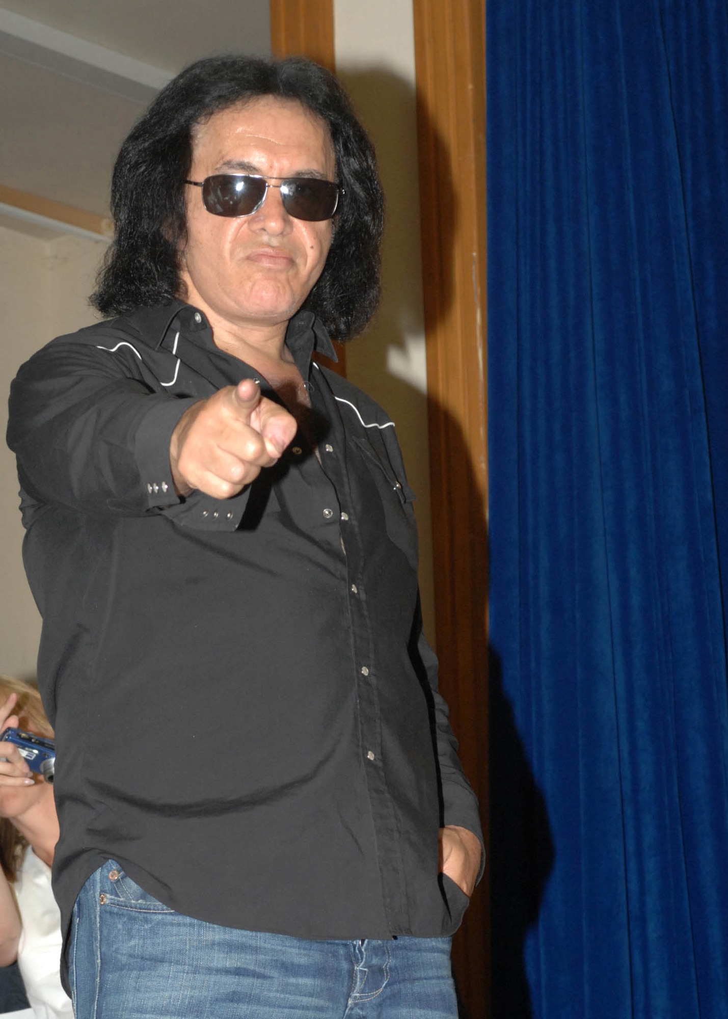 SPANGDAHLEM AIR BASE, Germany -- Kiss lead vocalist and bass guitarist Gene Simmons interacts with Airmen and their familiy members at the Kiss Autograph Session at the Brick House June 26, 2008. (U.S. Air Force photo by Airman 1st Class Jenifer Calhoun)