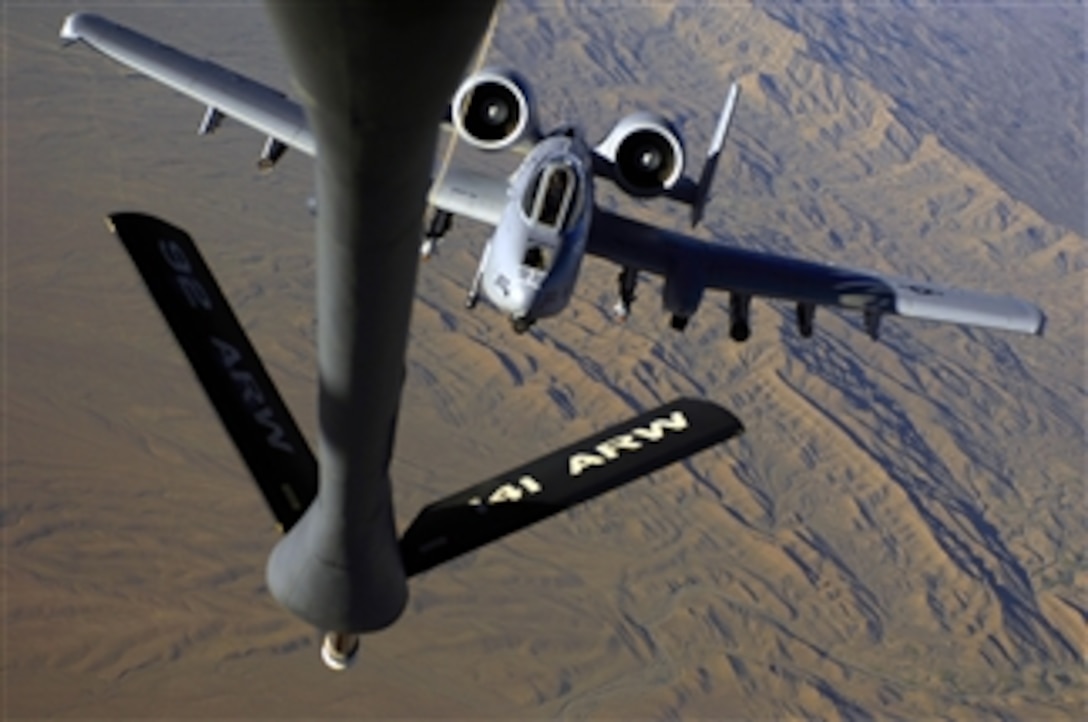 A U.S. Air Force A-10 Thunderbolt II aircraft moves into position to refuel from a KC-135 Stratotanker aircraft while on a mission over Afghanistan on May 29, 2008.  The Stratotanker is assigned to the Expeditionary Air Refueling Squadron, 376th Air Expeditionary Wing.  