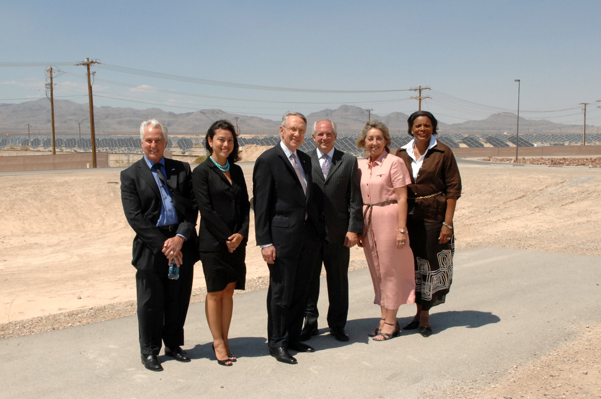 From left, Somer Hollingsworth , Nevada Development Authority; Anna Soellner, Center for American Progress Action Fund; Sen. Harry Reid, U.S. Senate majority leader; Dr. David Ashley, University of Nevada Las Vegas president; Sen. Dina Titus, Nevada state senator and Rose McKinney James (right), Energy Foundation, view the photovoltaic array on Nellis Air Force Base, Nev. July 1, 2008. Senator Reid held a press conference at the Armed Forces Reserve Center on Nellis AFB to announce the National Clean Energy Summit, to be held at the University of Nevada Las Vegas on August 19, 2008. (U.S. Air Force photo / Senior Airman Kasabyan D. Musal, RELEASED)